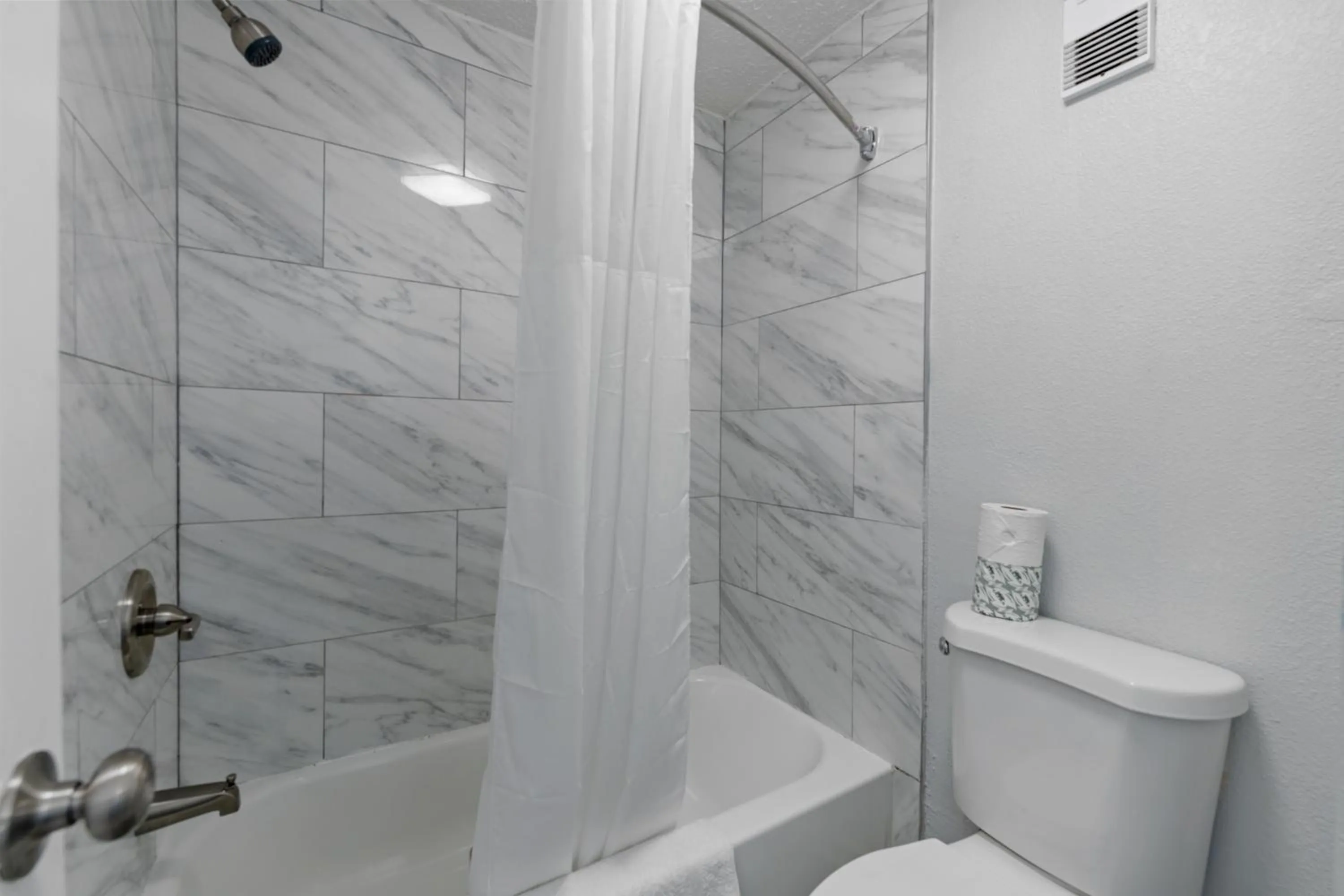 Shower in Budget Inn-Norfolk, VA - Oceanview
