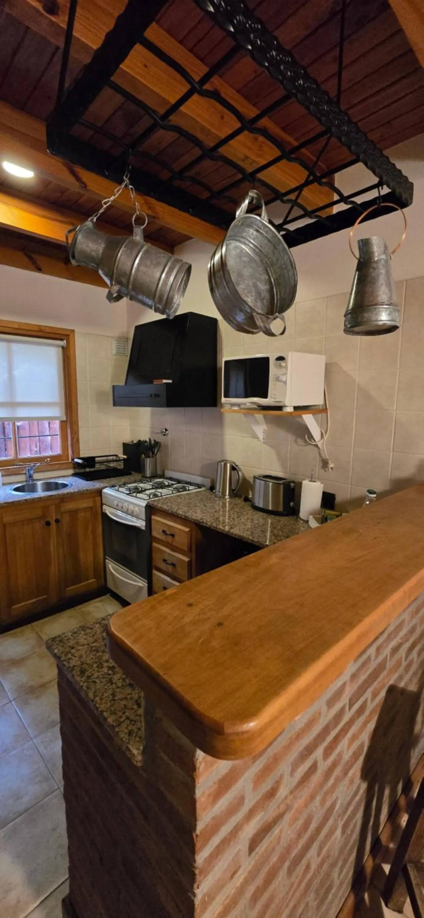 Kitchen or kitchenette in Apart Hotel Agua Escondida