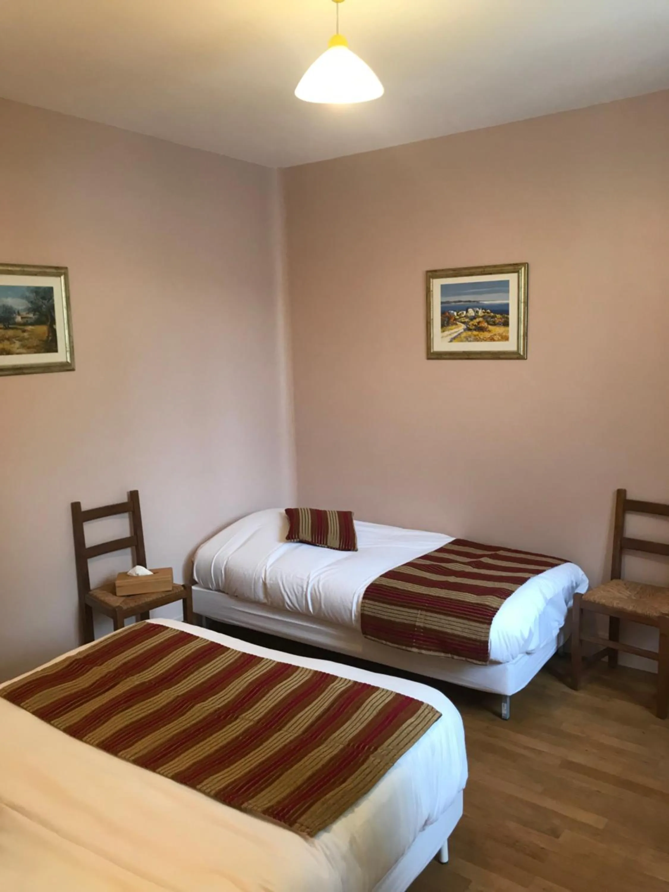 Bed in HÔTEL LES IRIS