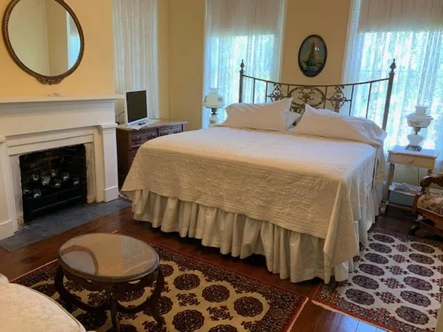 Photo of the whole room, Bed in 1872 Denham Inn