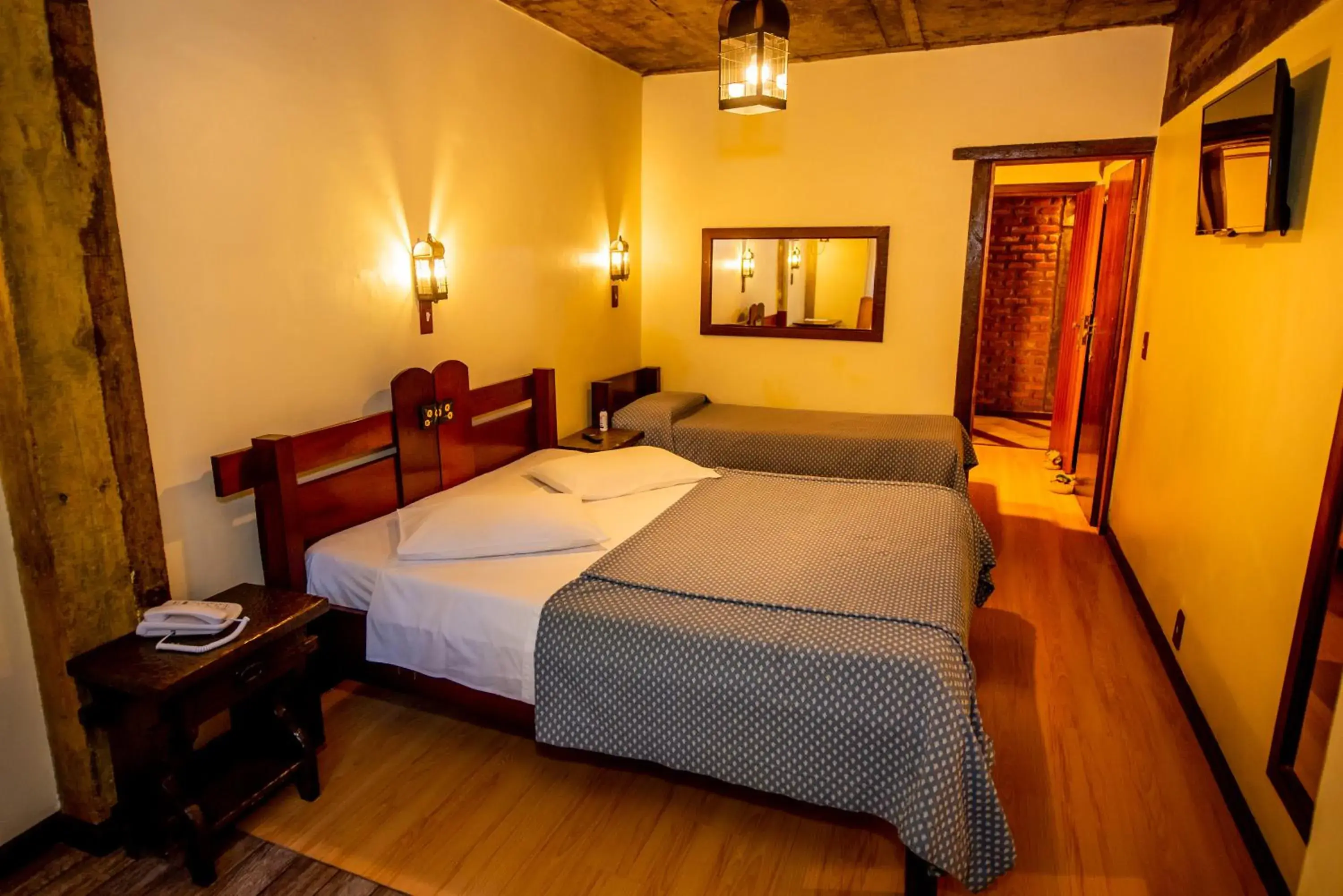 Triple Room in Pousada Monte Imperial Triple Room in Pousada Monte Imperial