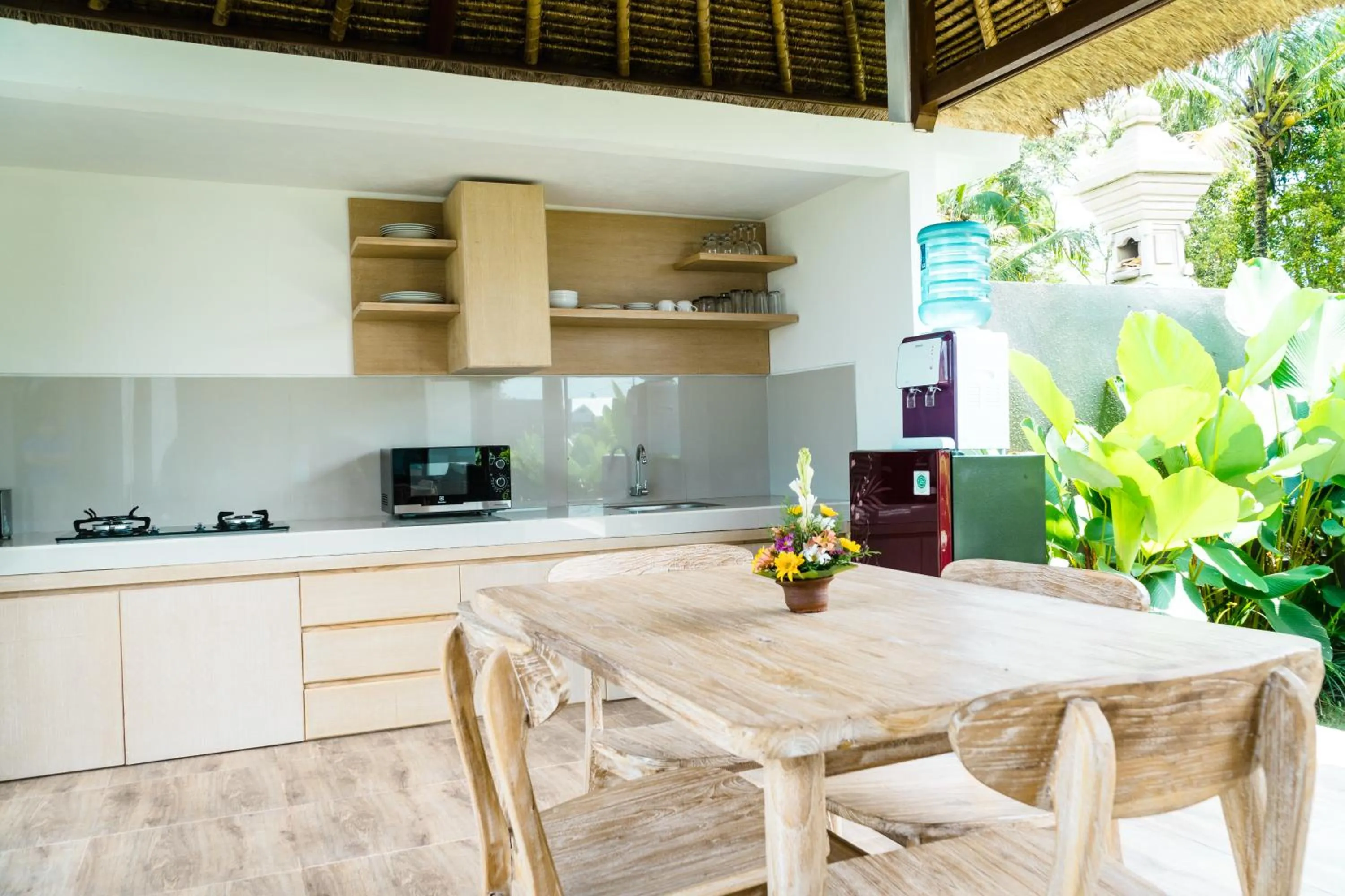 Kitchen or kitchenette in Three Gold Luxury Private Villas