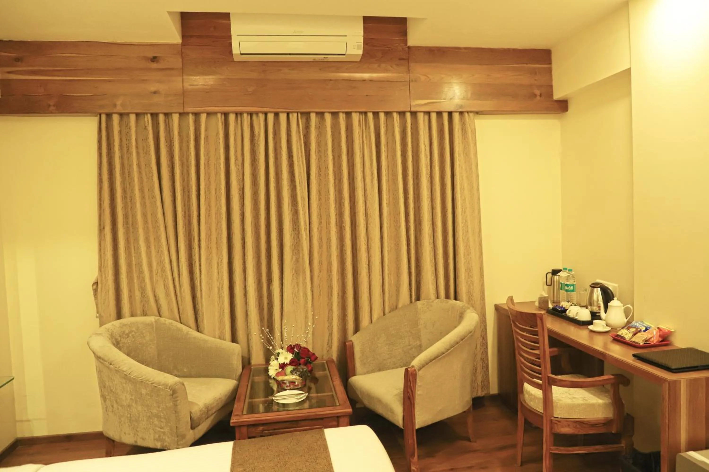 Seating area in Sai Neem Tree Hotel