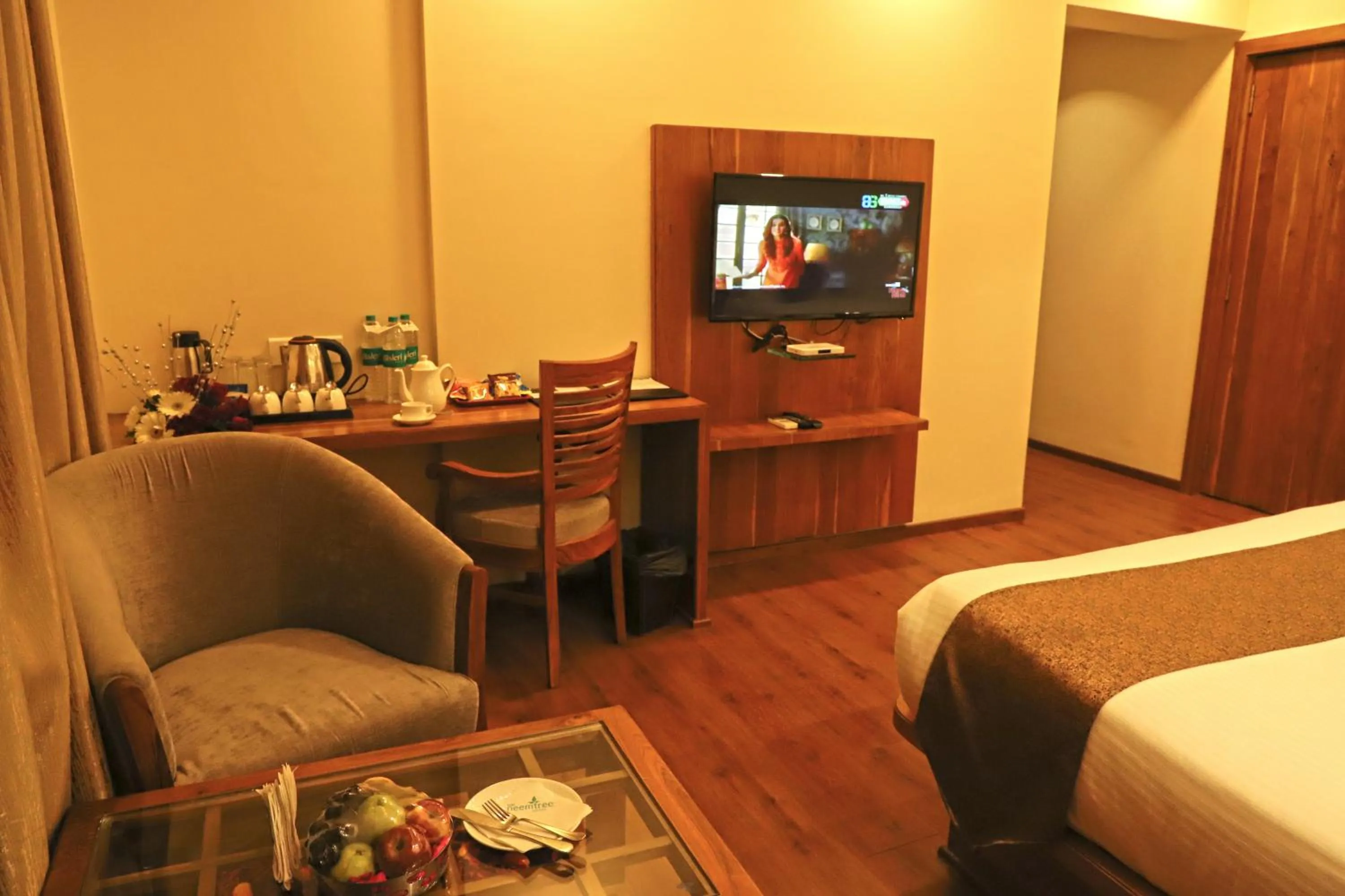 Bed in Sai Neem Tree Hotel