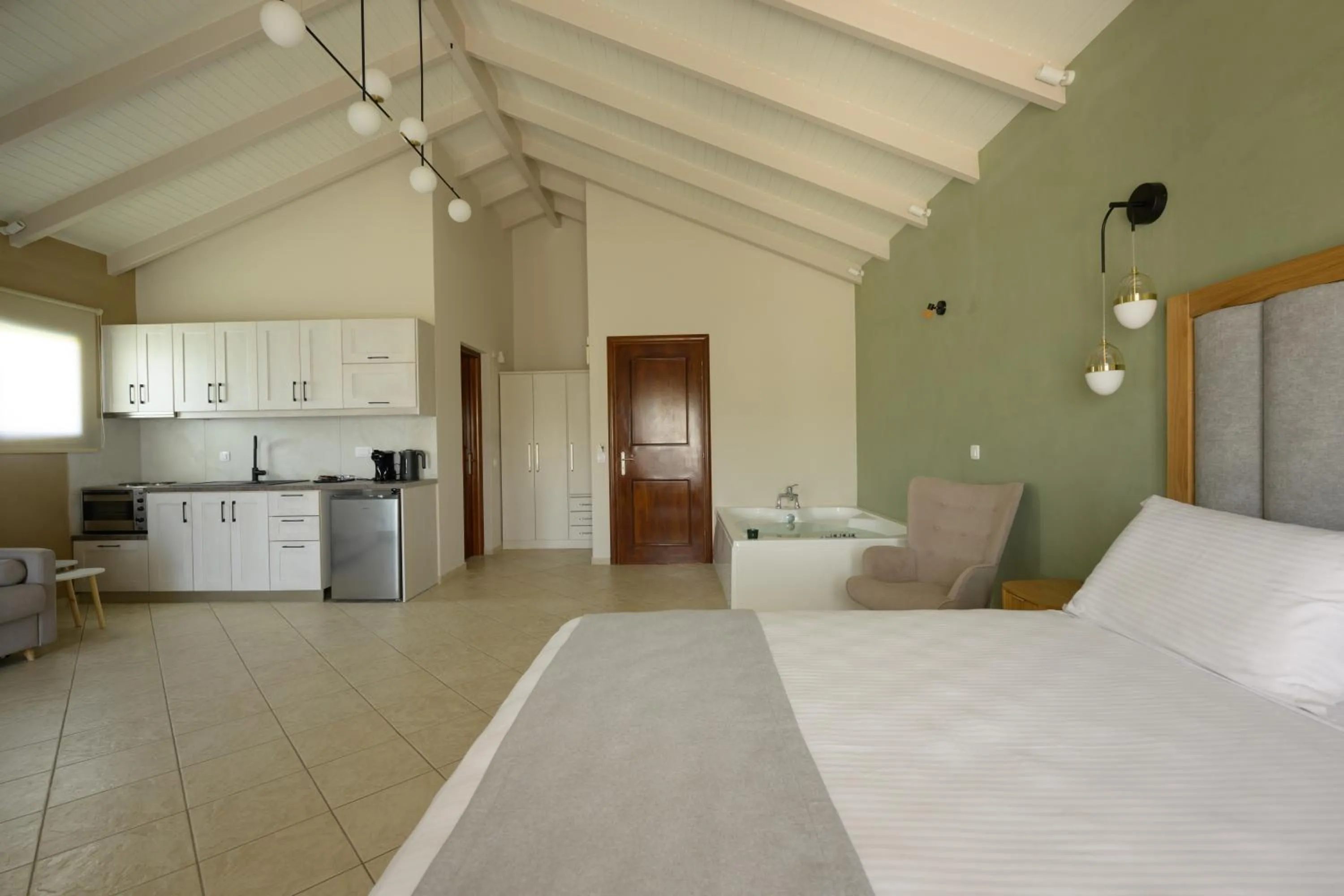 Seating area, Bed in Villa Apollo