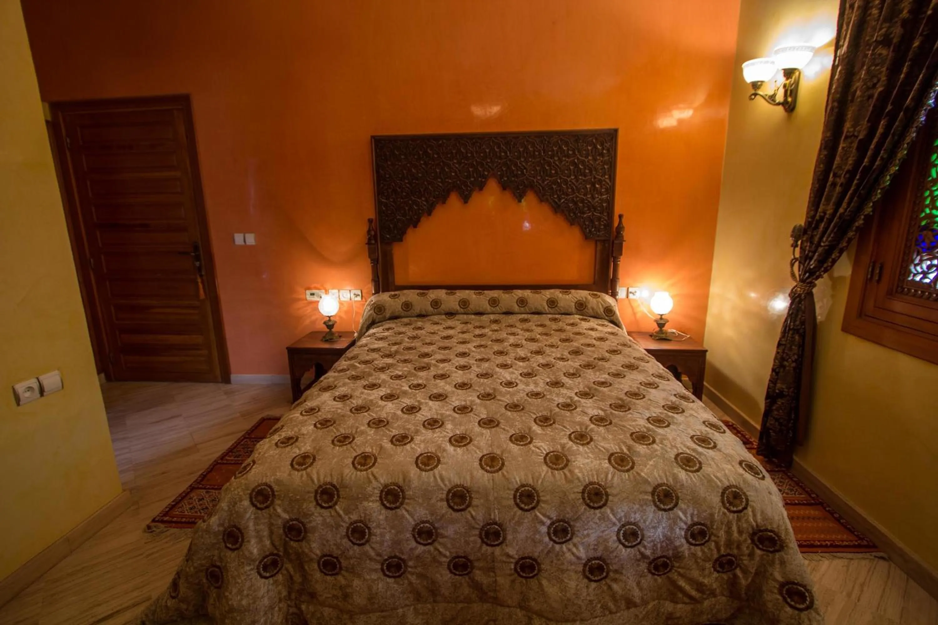 Bed in Riad Raouia HAMMAM & SPA