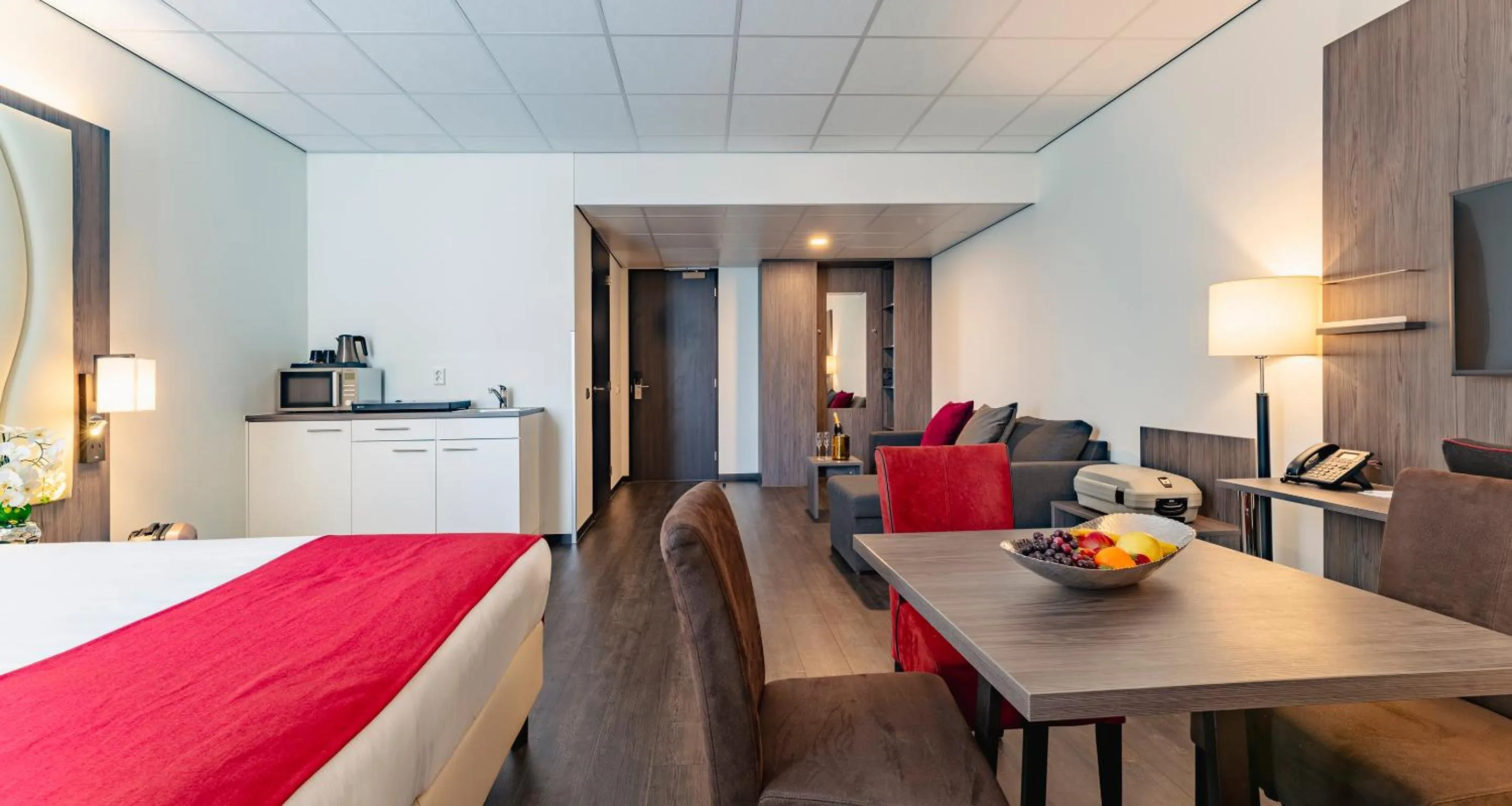 Kitchen or kitchenette, Bed in PLAZA Premium Almere