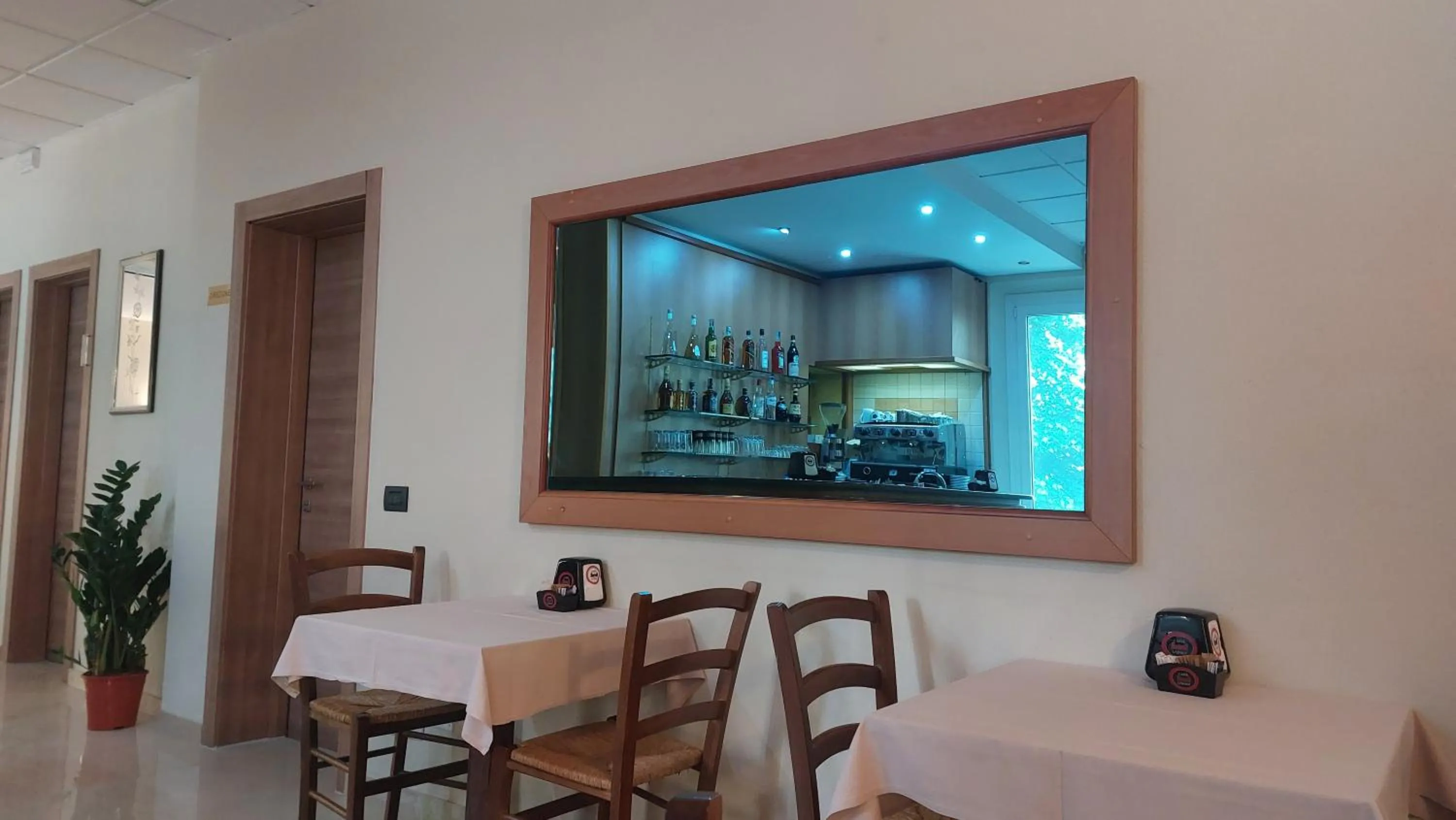 Communal lounge/ TV room in Hotel La Torre