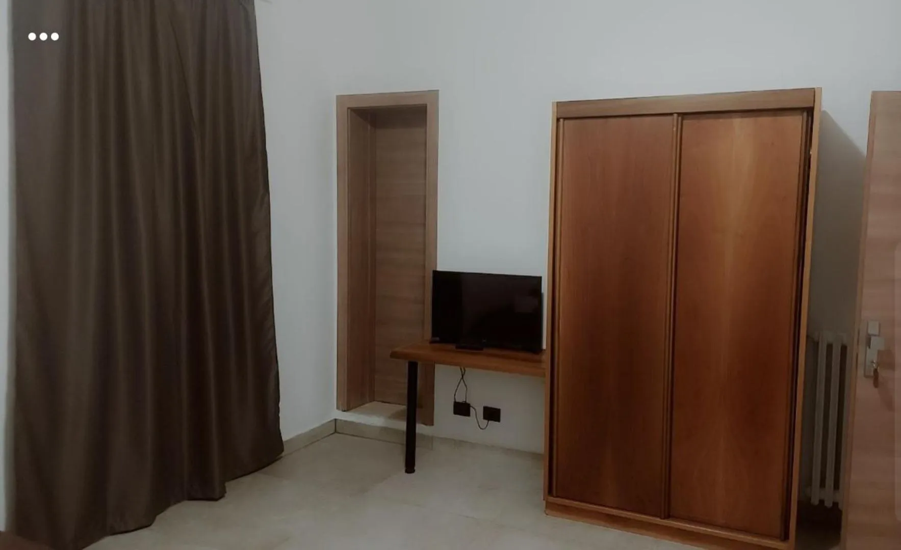 Bedroom in Hotel La Torre