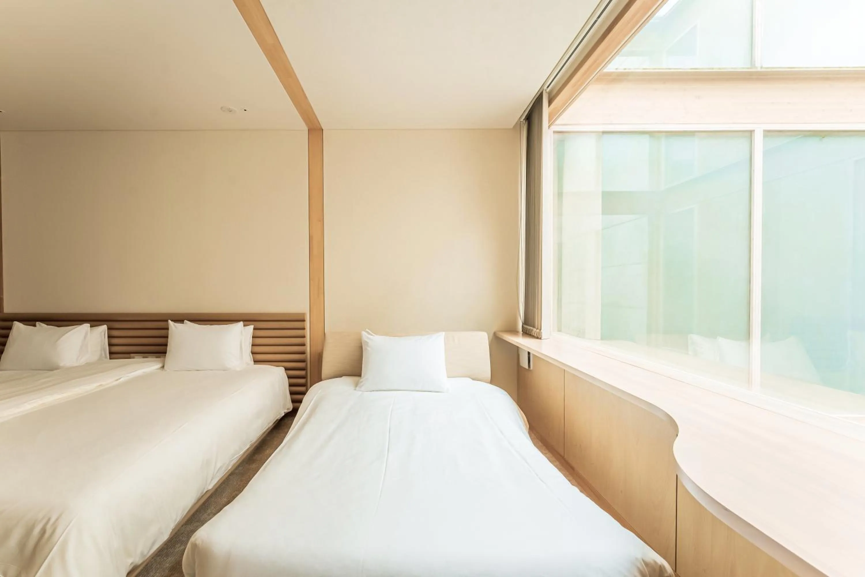 Bed in Shonai Hotel Suiden Terrasse