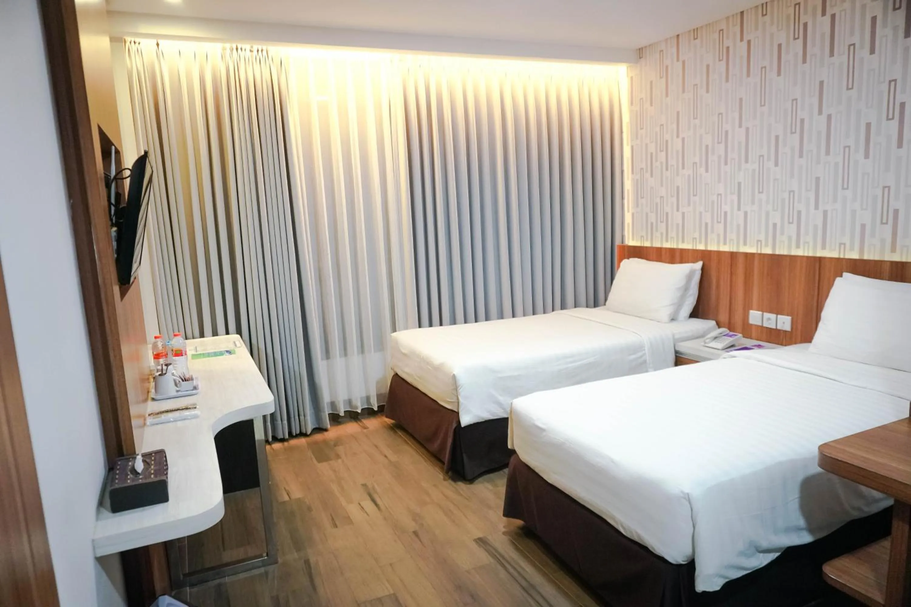 Bed in Harmoni Hotel Garut