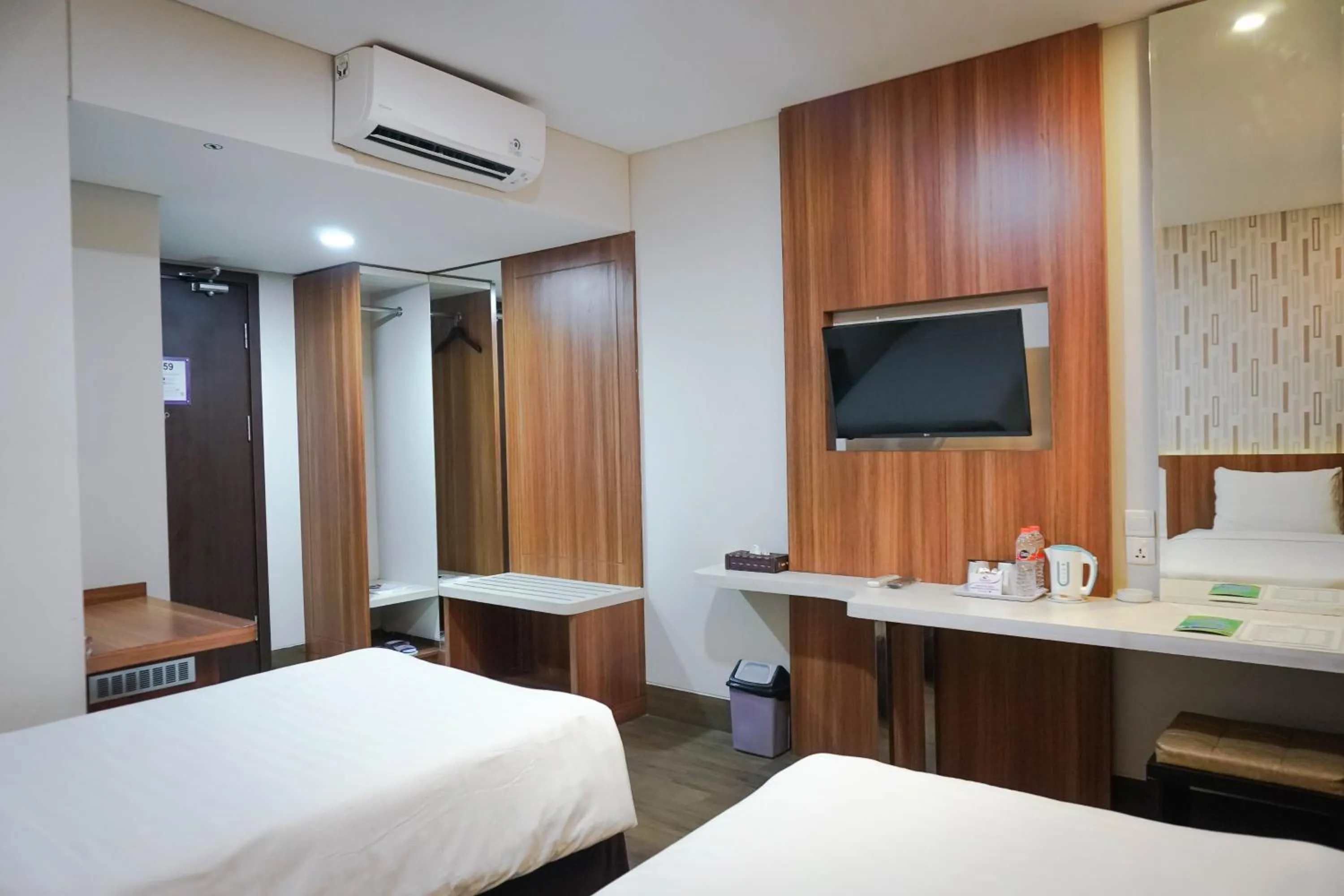 Bed in Harmoni Hotel Garut