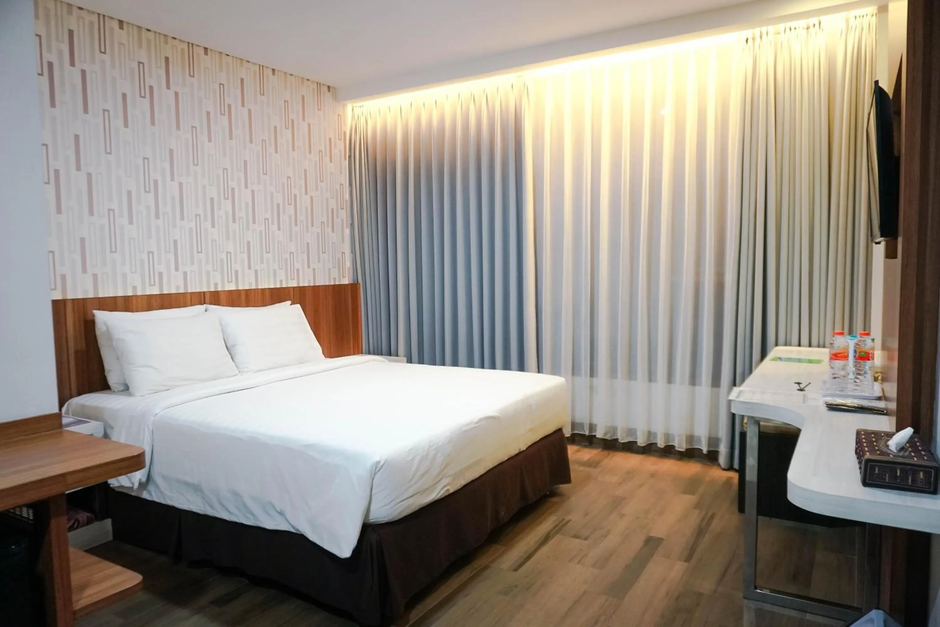 Bed in Harmoni Hotel Garut