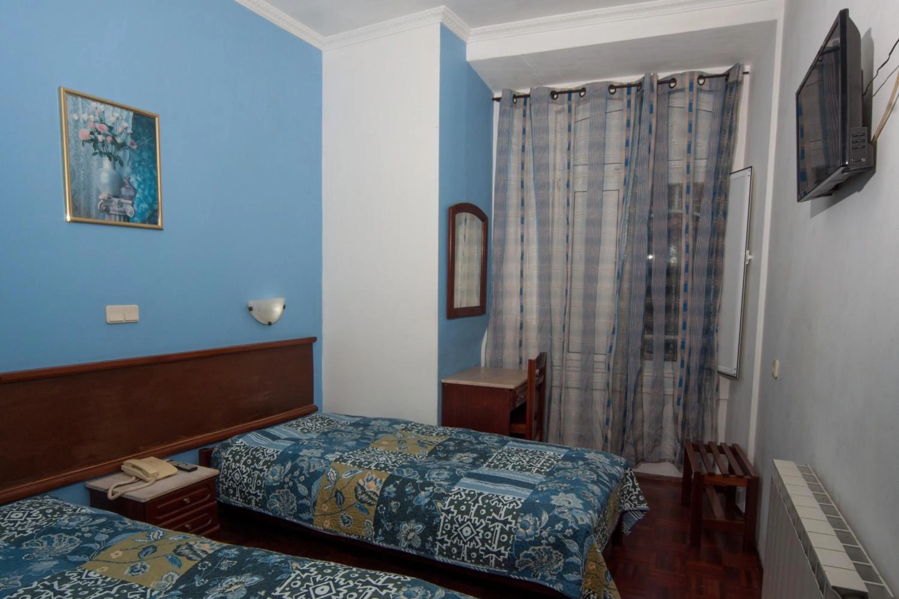 Bed in Hotel Leiriense