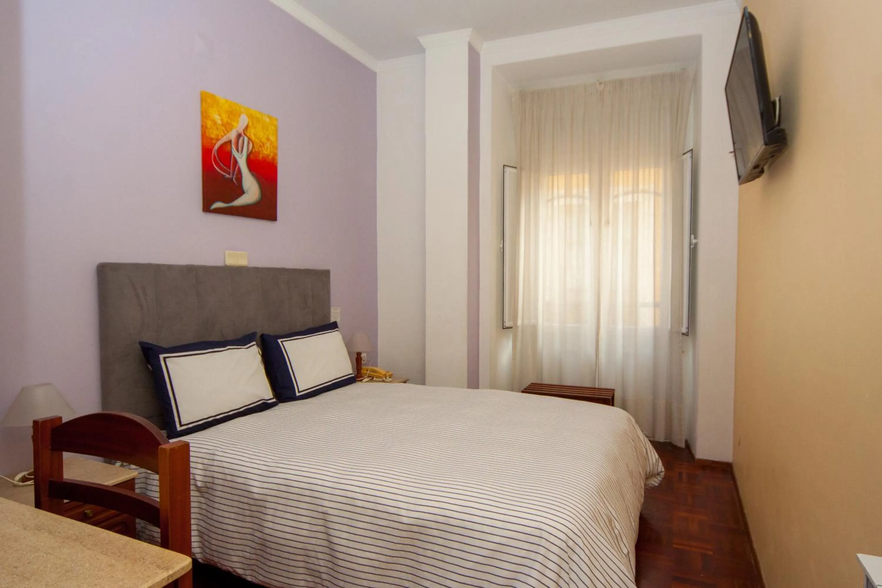 Bed in Hotel Leiriense