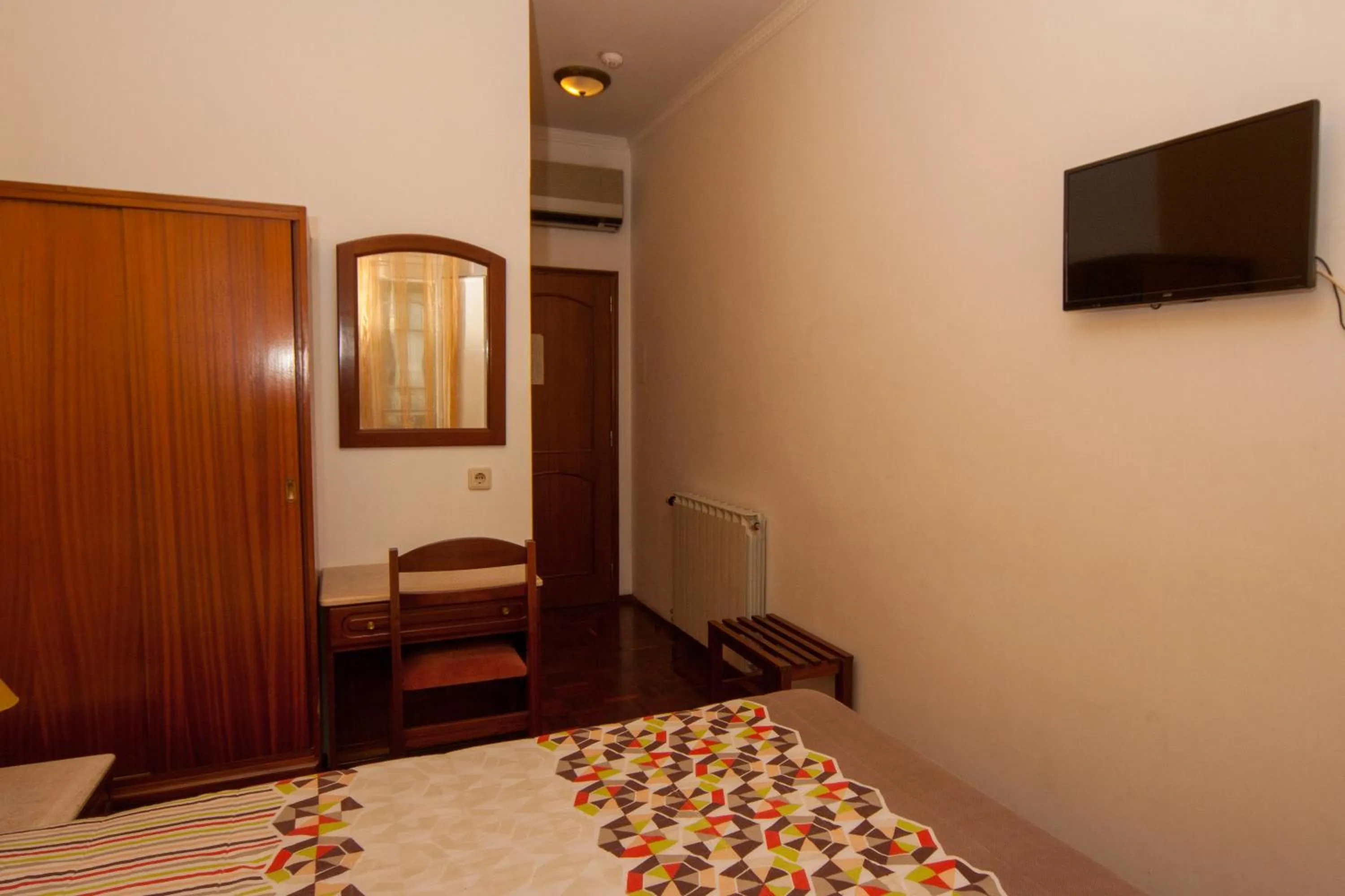 Bed in Hotel Leiriense