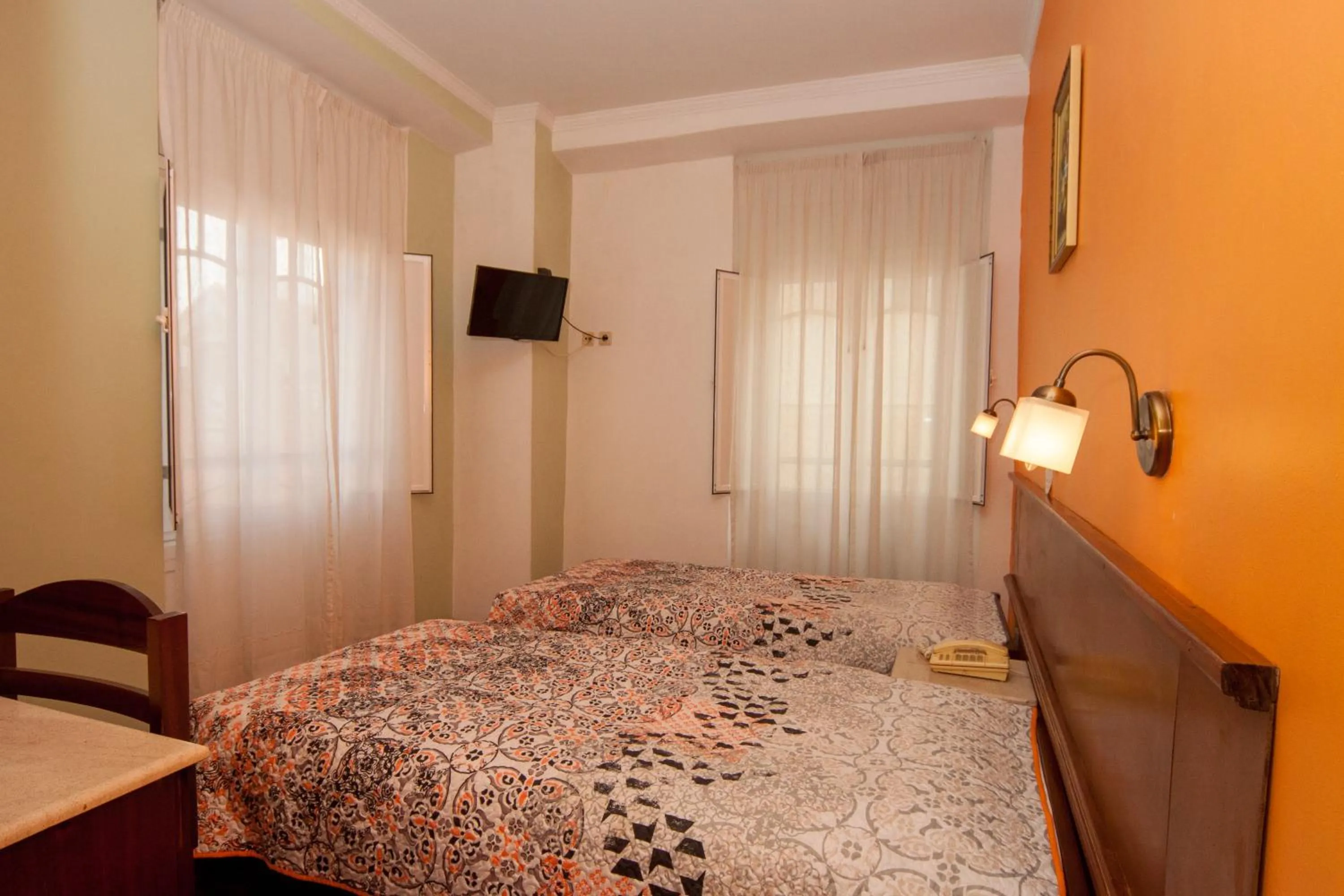 Bed in Hotel Leiriense