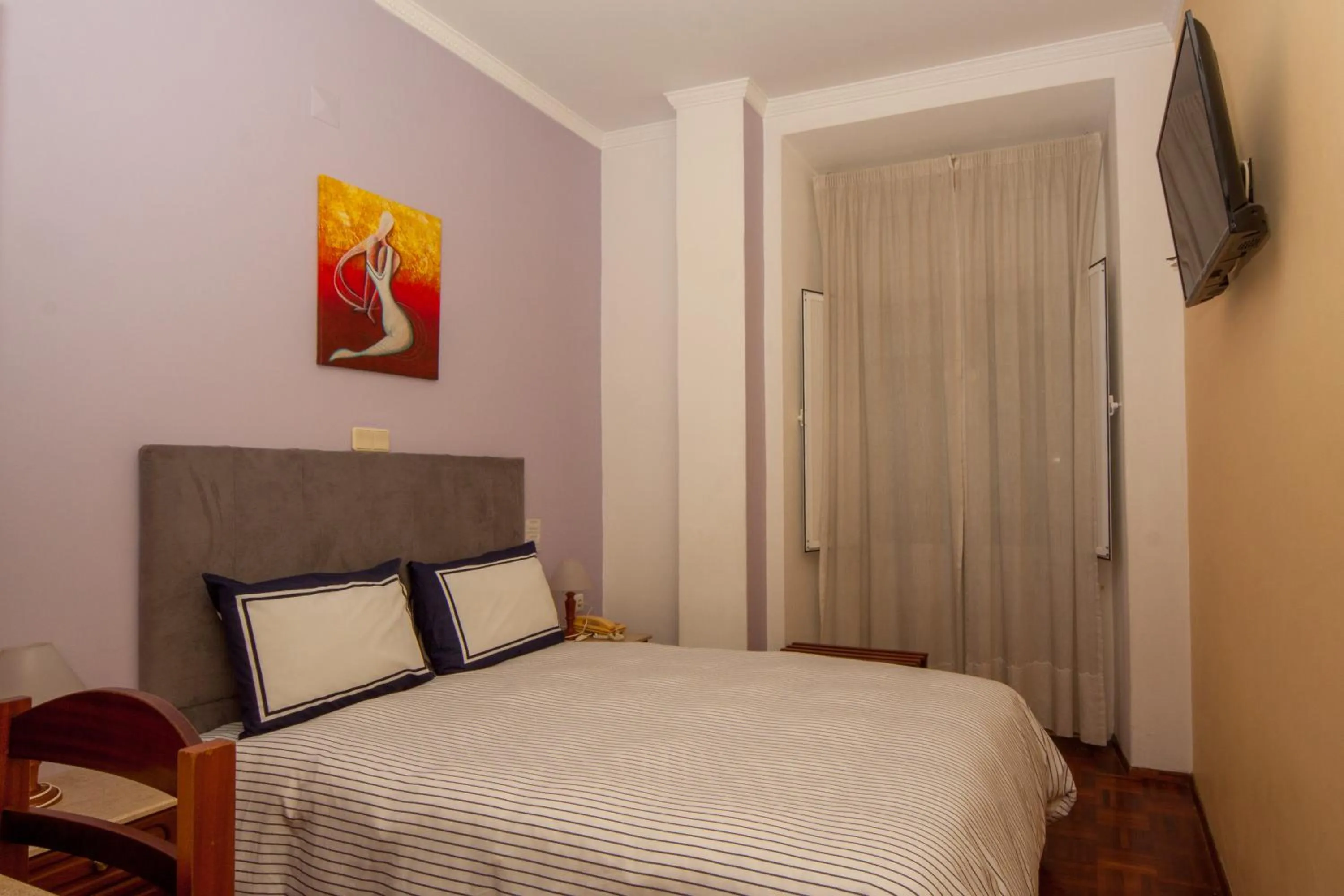 Bed in Hotel Leiriense