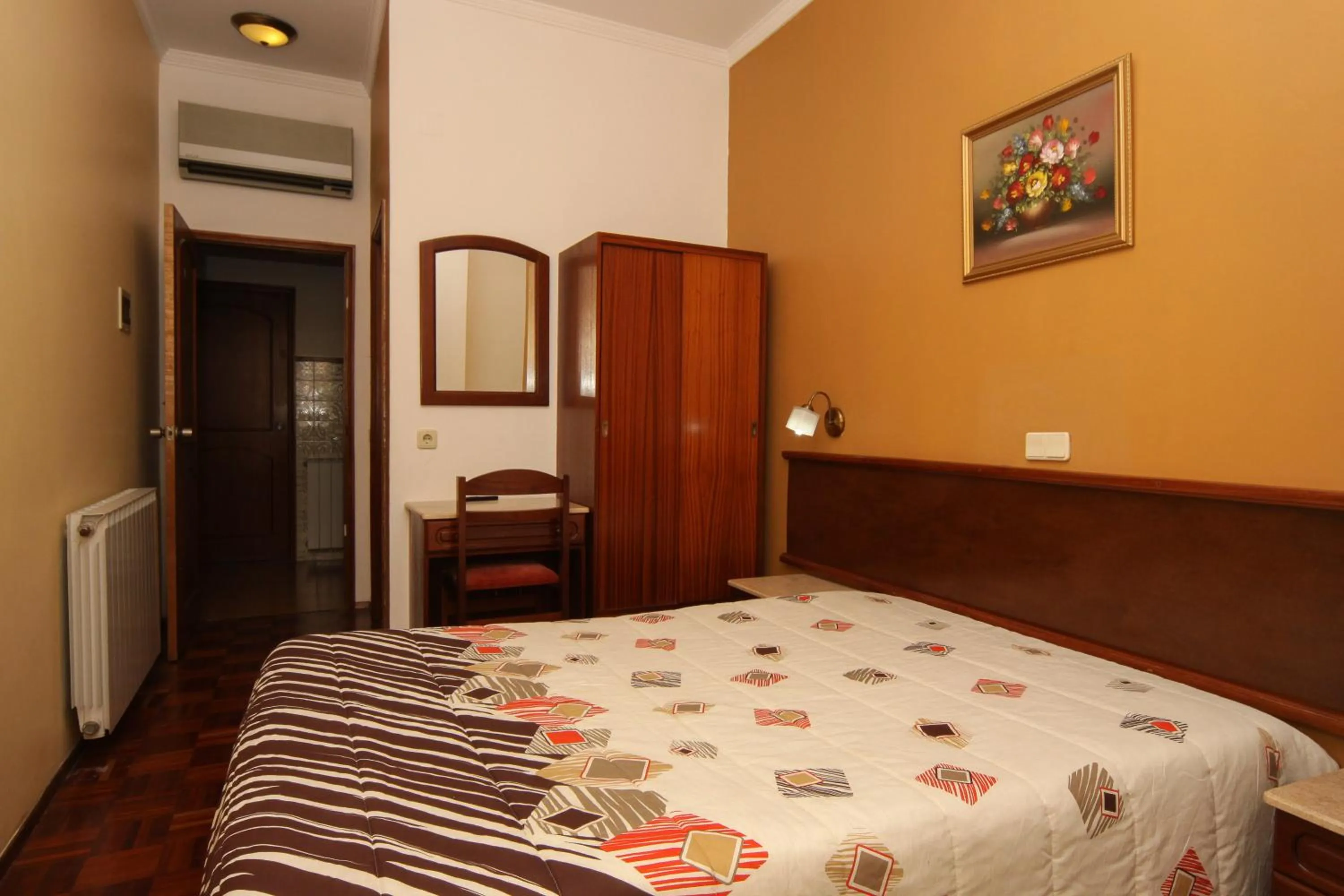 Bed in Hotel Leiriense