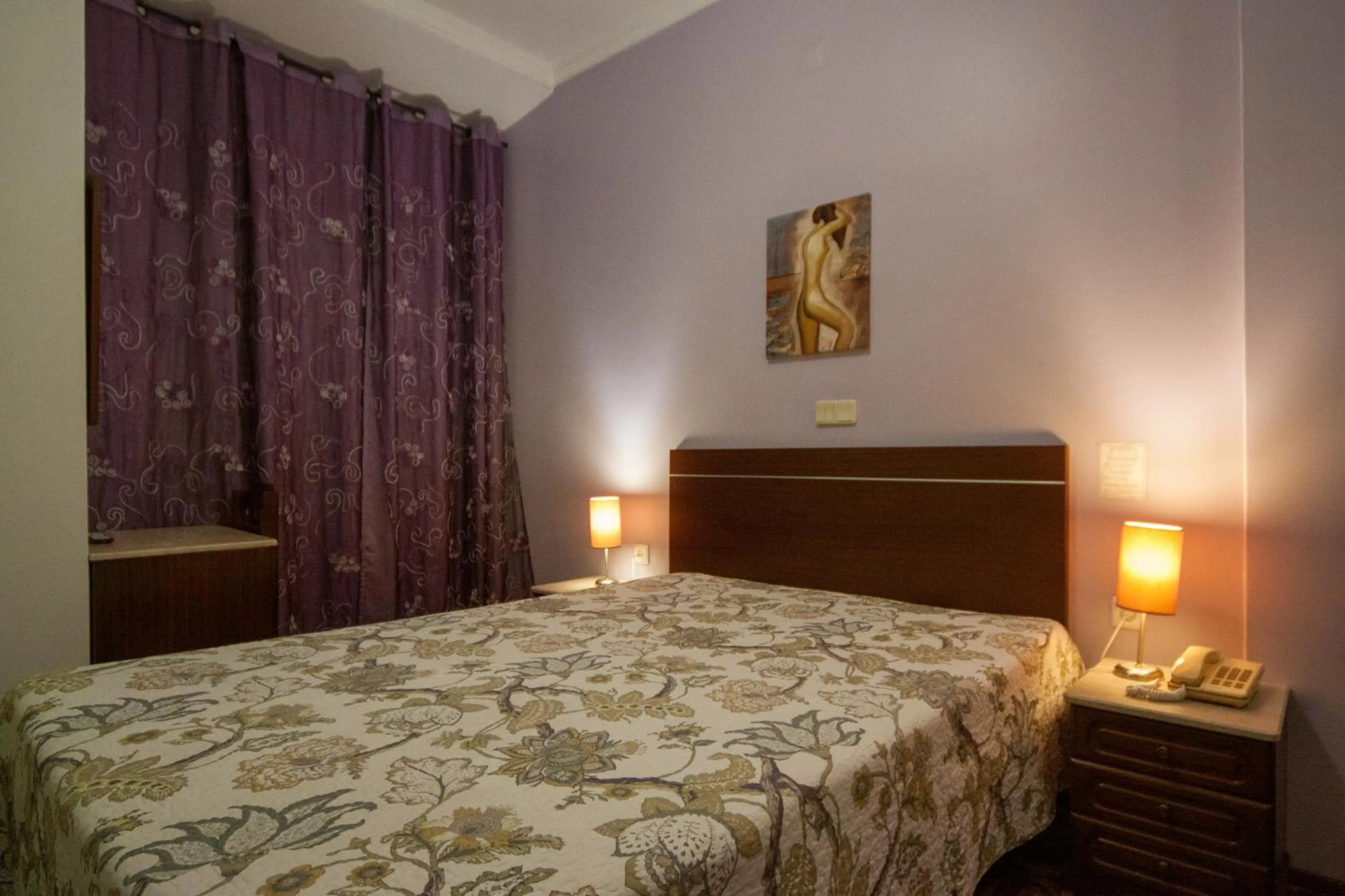 Bed in Hotel Leiriense