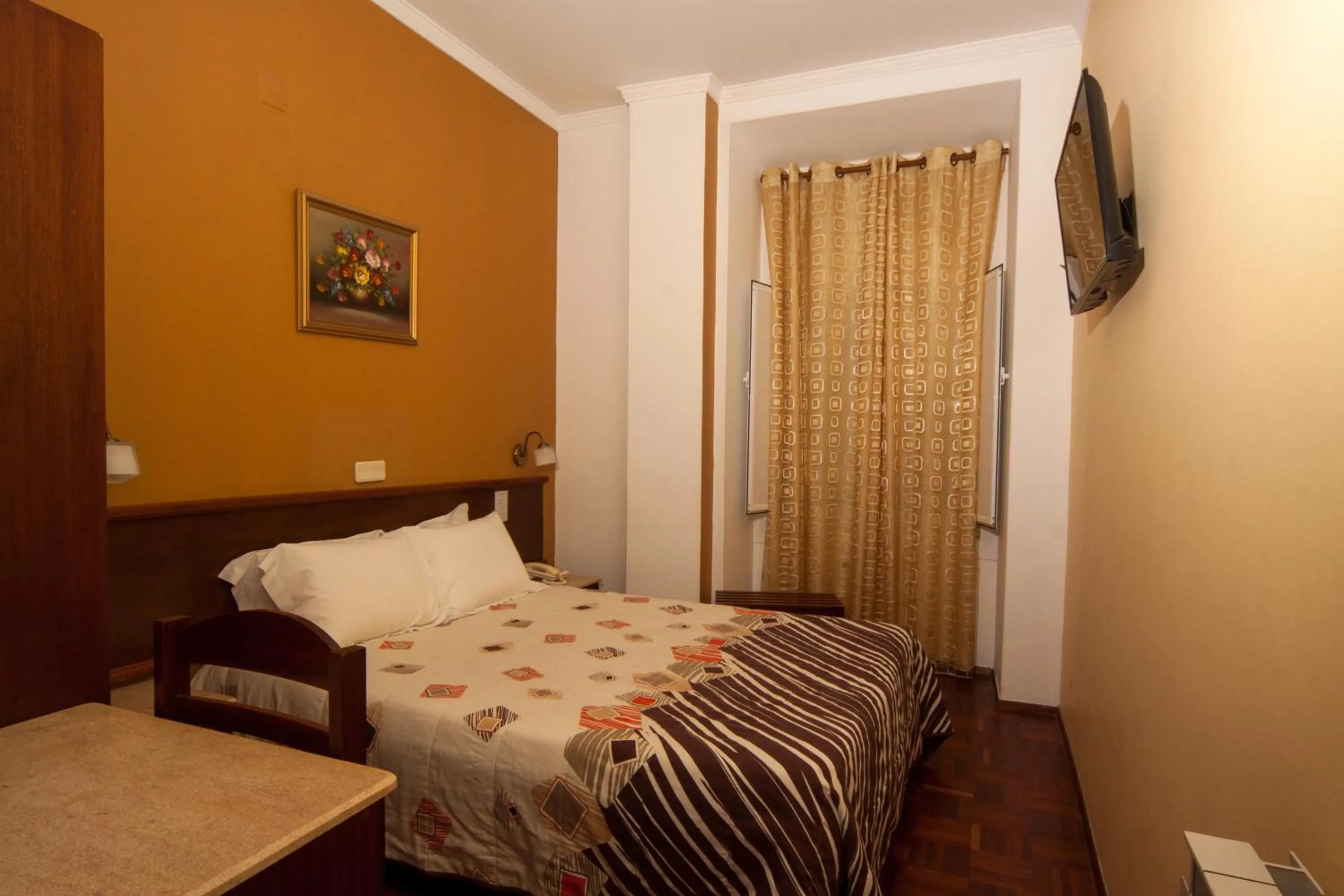 Bed in Hotel Leiriense