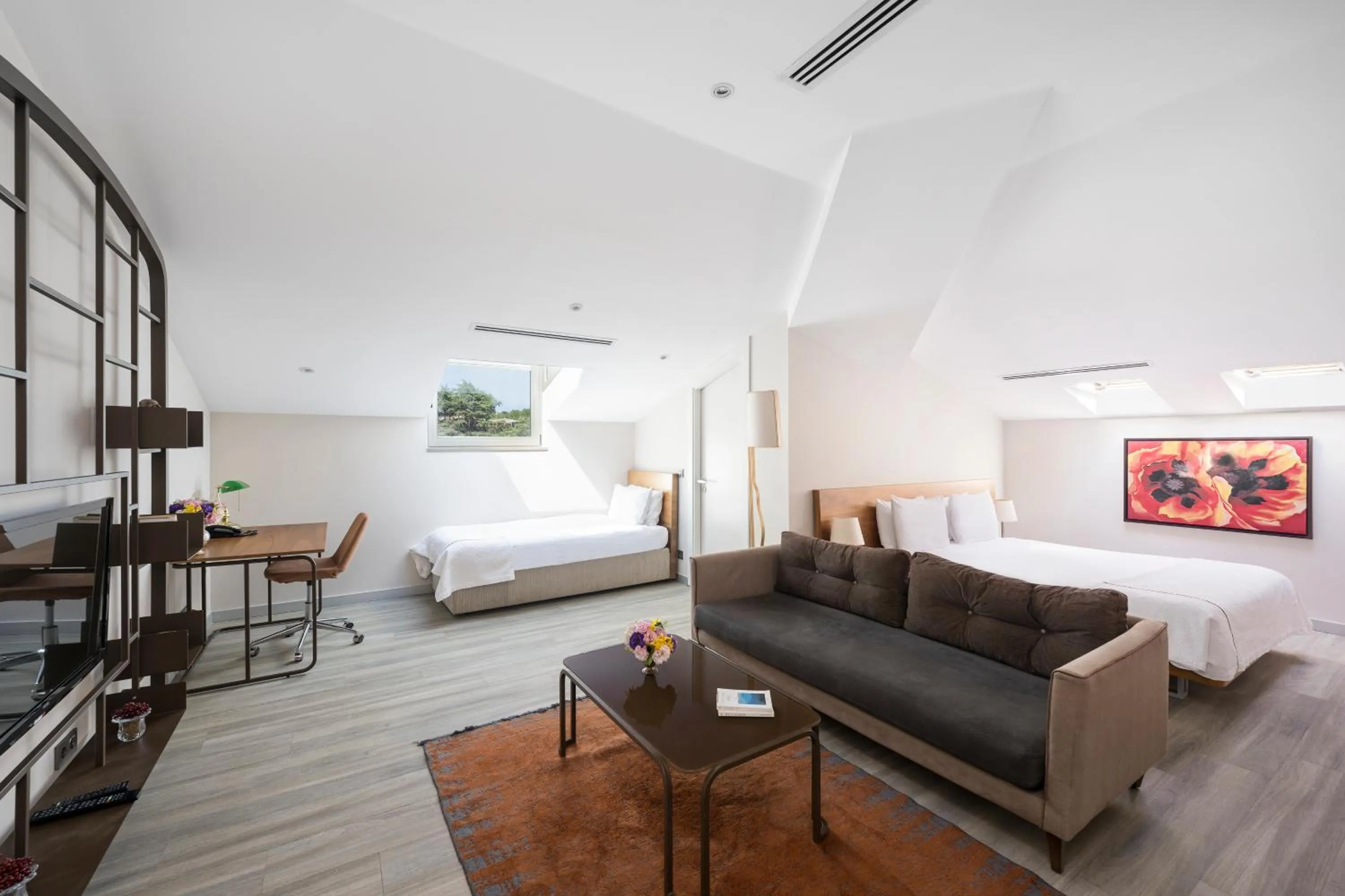 Bed in Upsuites Hotel