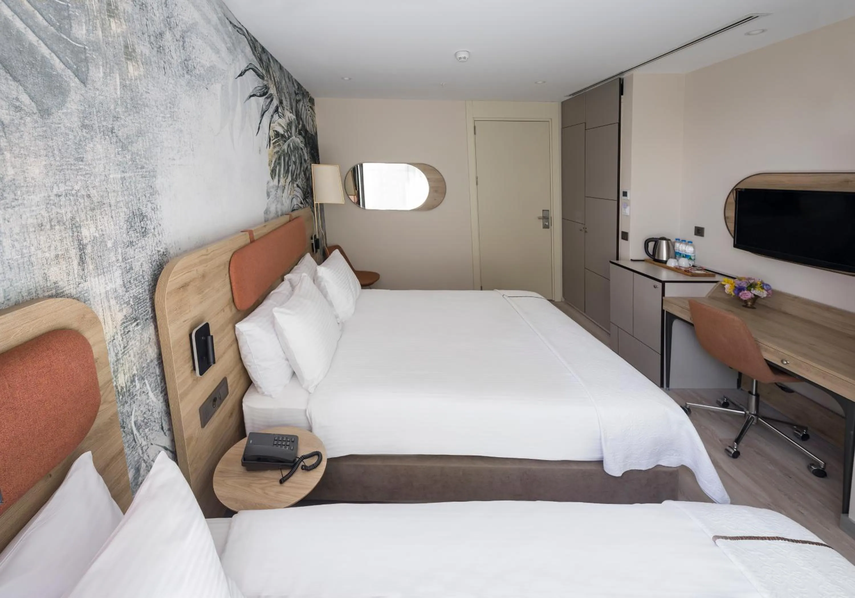 Bed in Upsuites Hotel