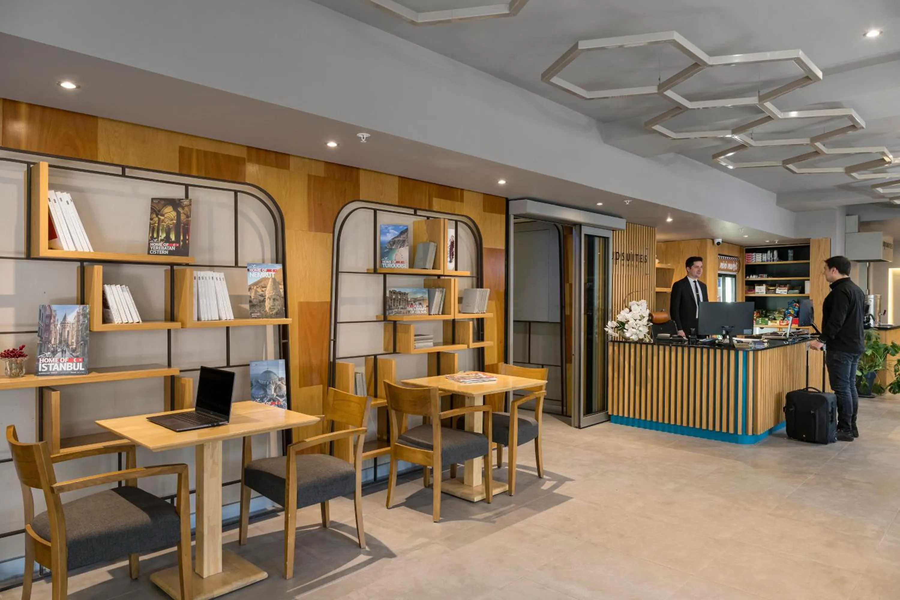 Lobby or reception in Upsuites Hotel