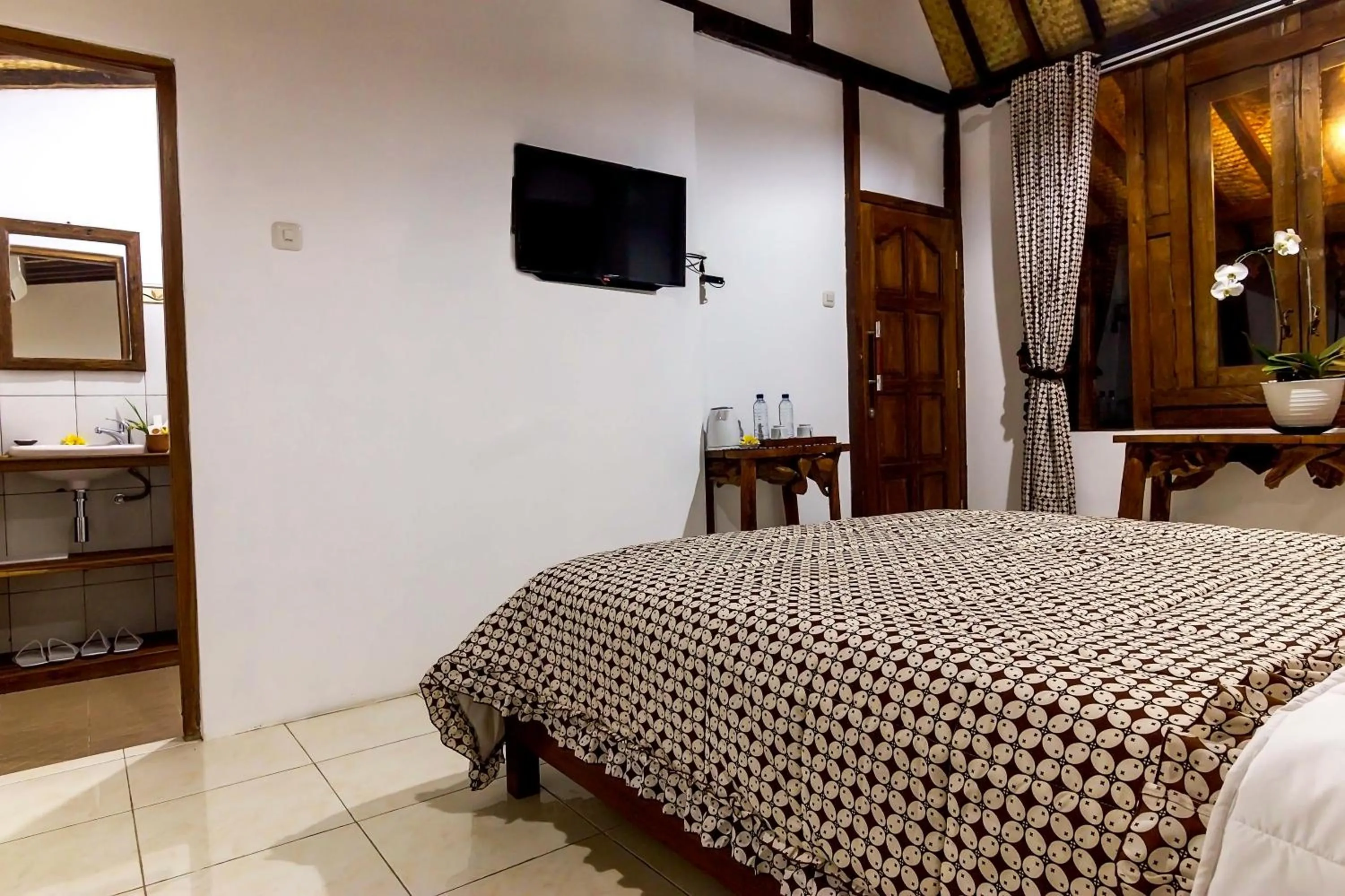 Bed in The Omah Borobudur