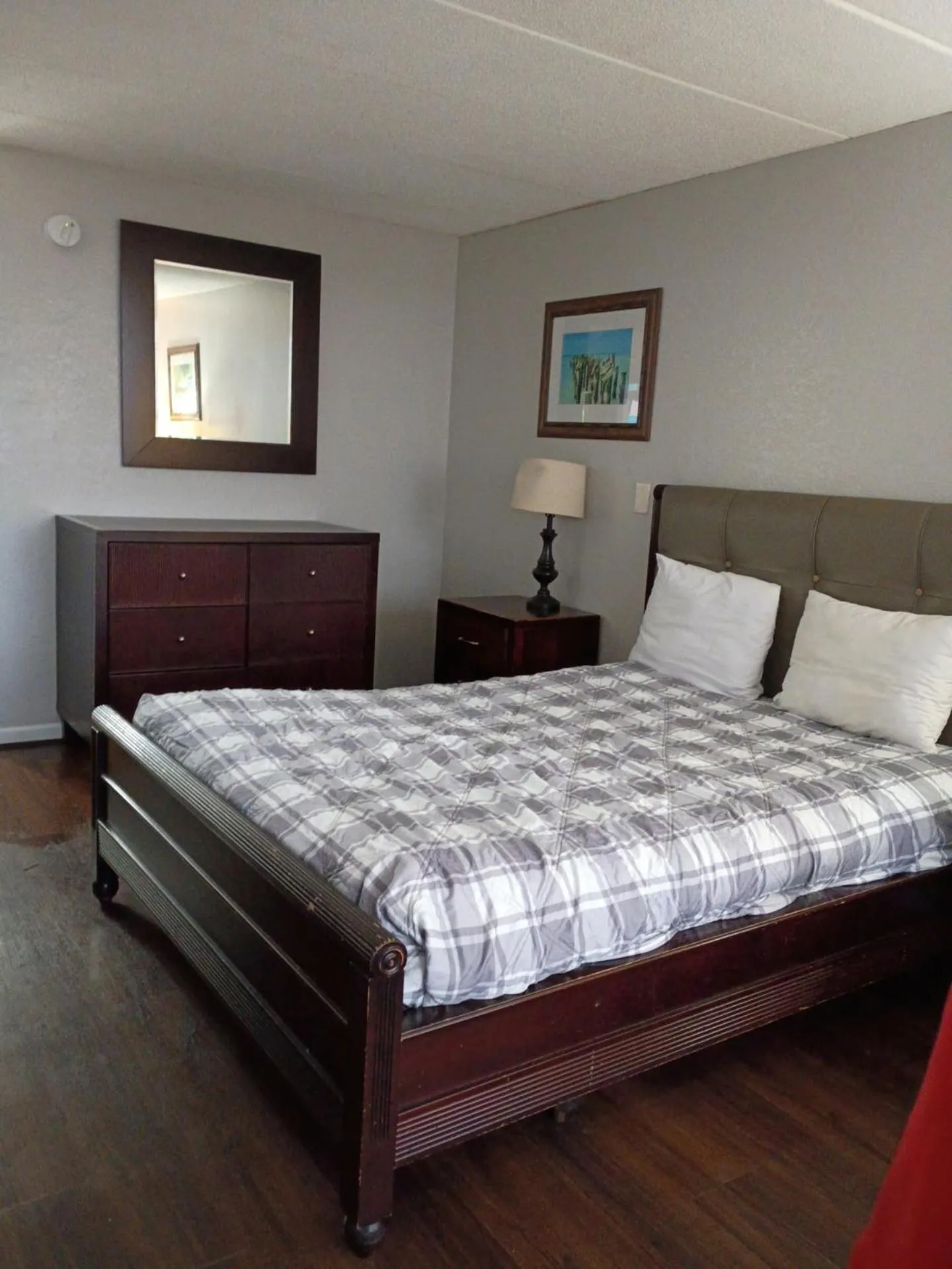 Bed in APM Inn and Suites