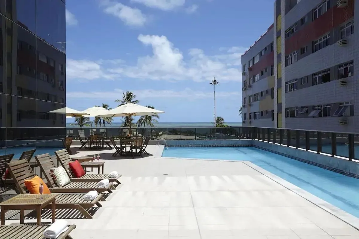 Swimming pool in HY BEACH FLATS - INTERNATIONAL