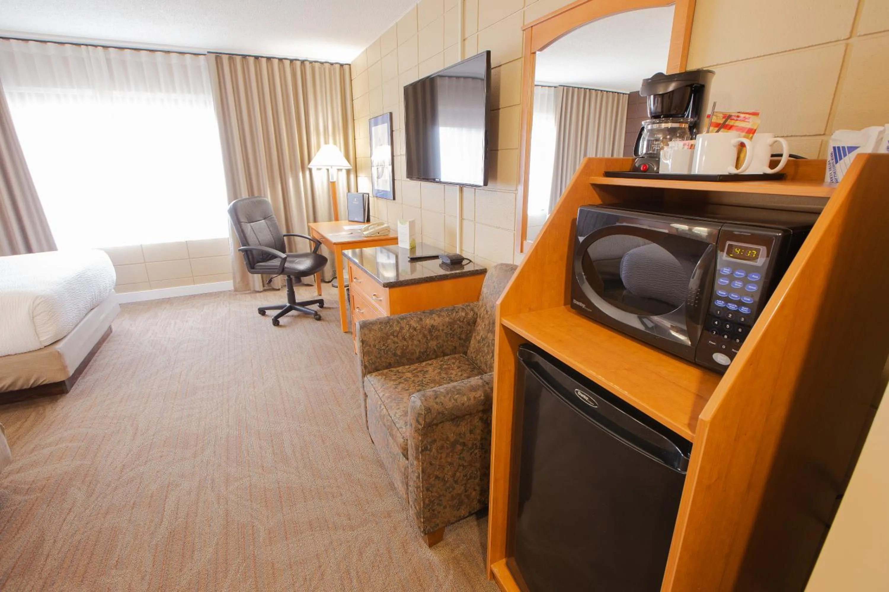 Bed in Neighbourhood Inn Hotels in Bonnyville