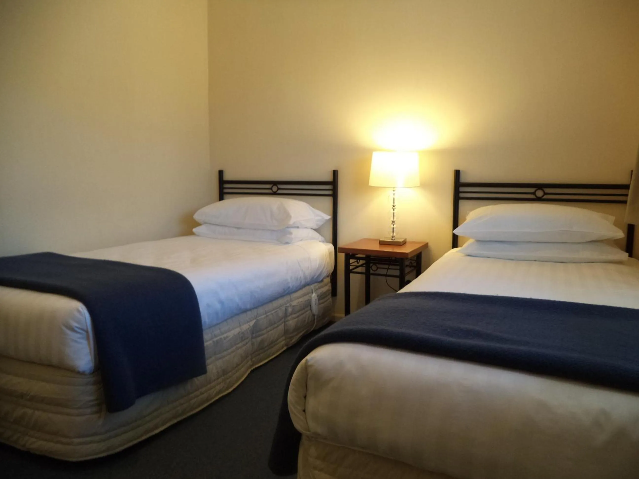 Bed in South Park Motel