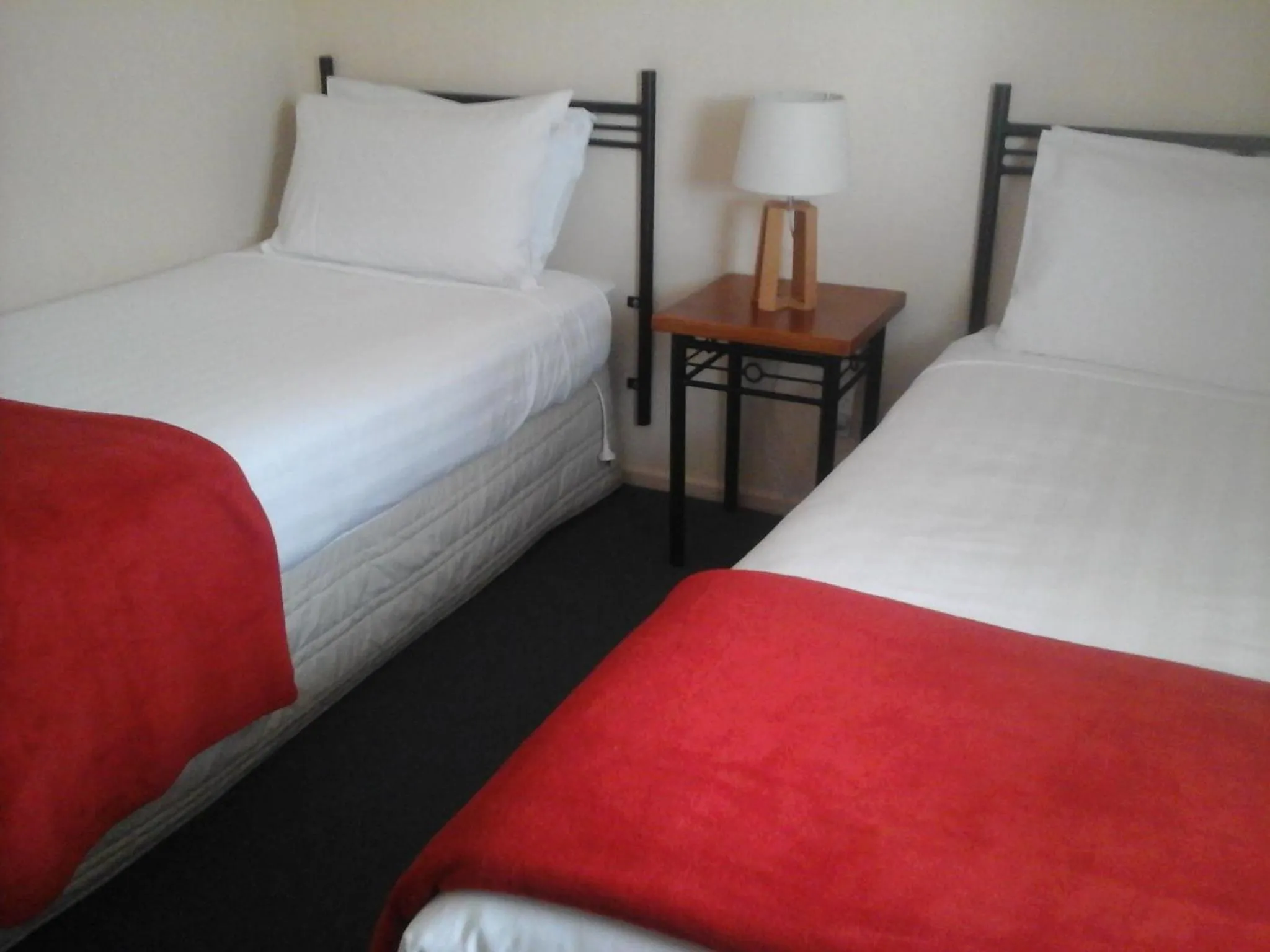 Bed in South Park Motel