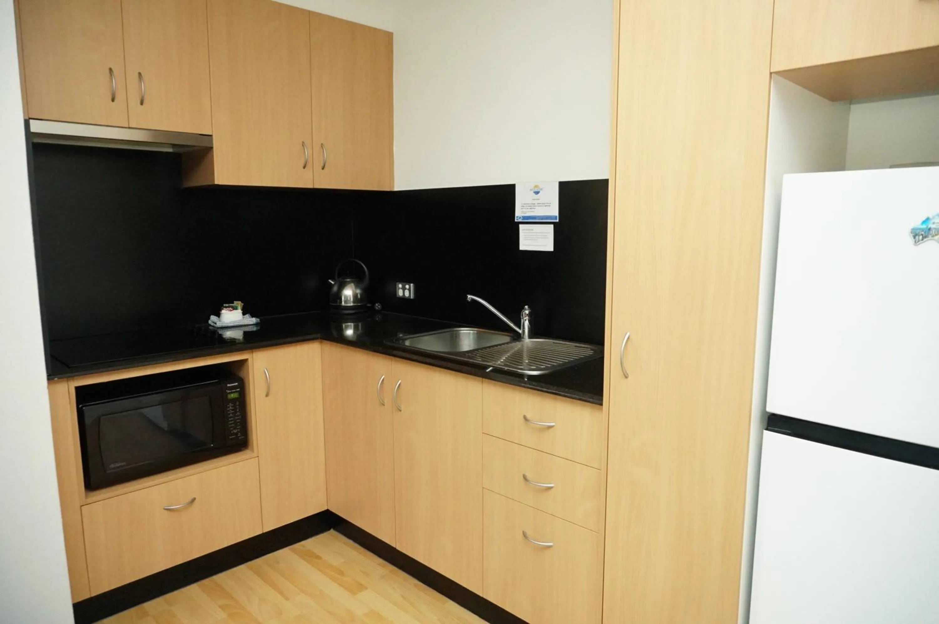 Kitchen or kitchenette in Aussie Resort