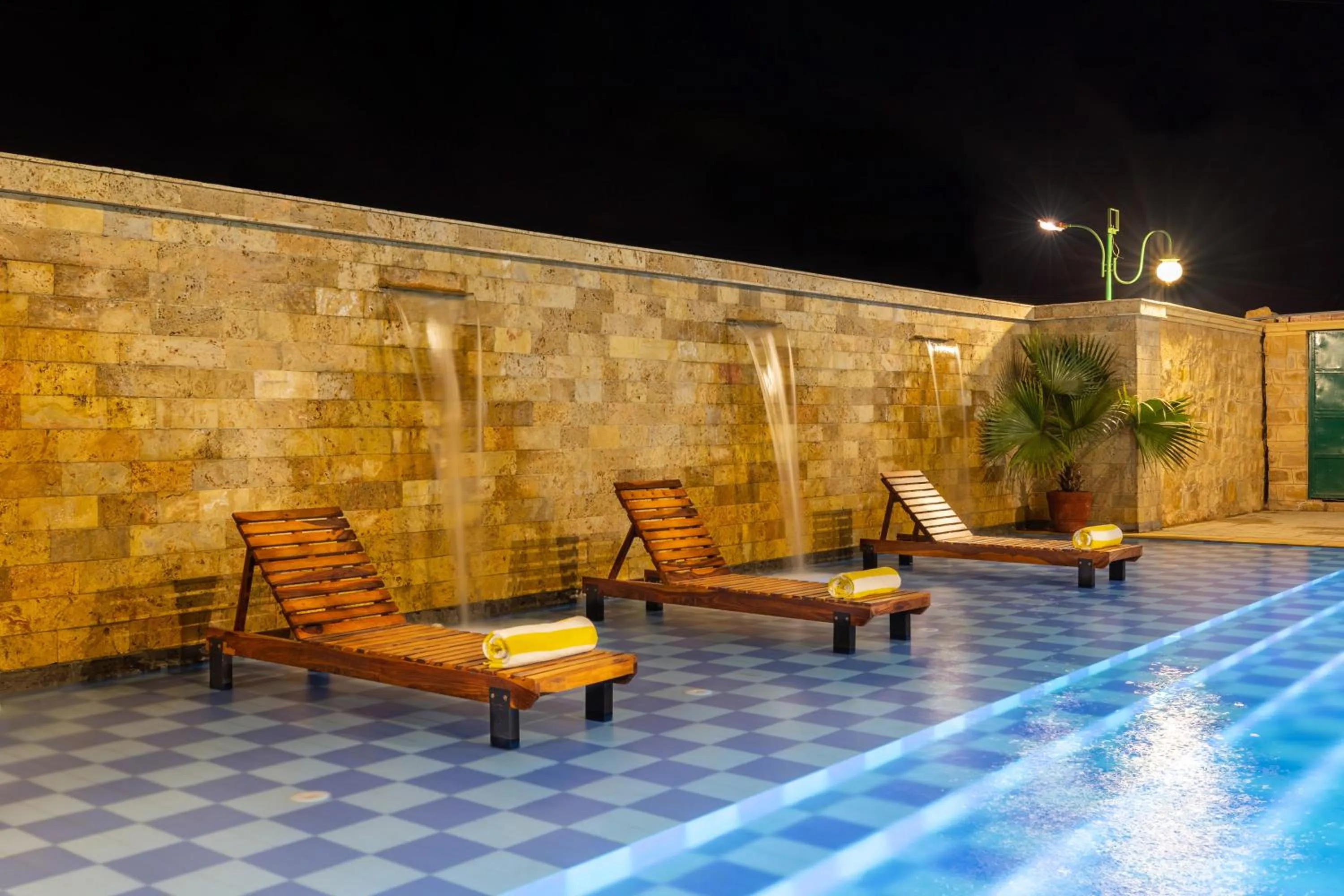 Swimming pool in Sairafort Sarovar Portico