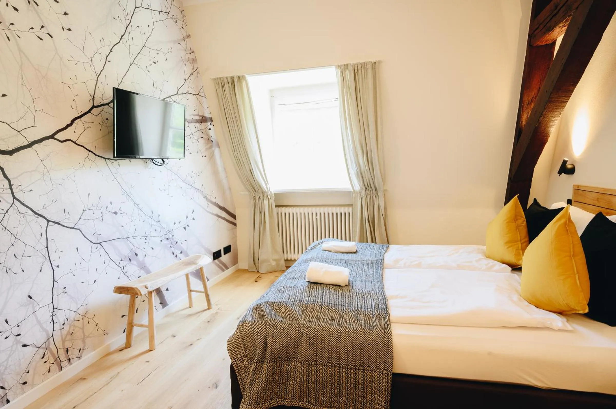 Bed in Boutiquehotel Kloster Pfalzel