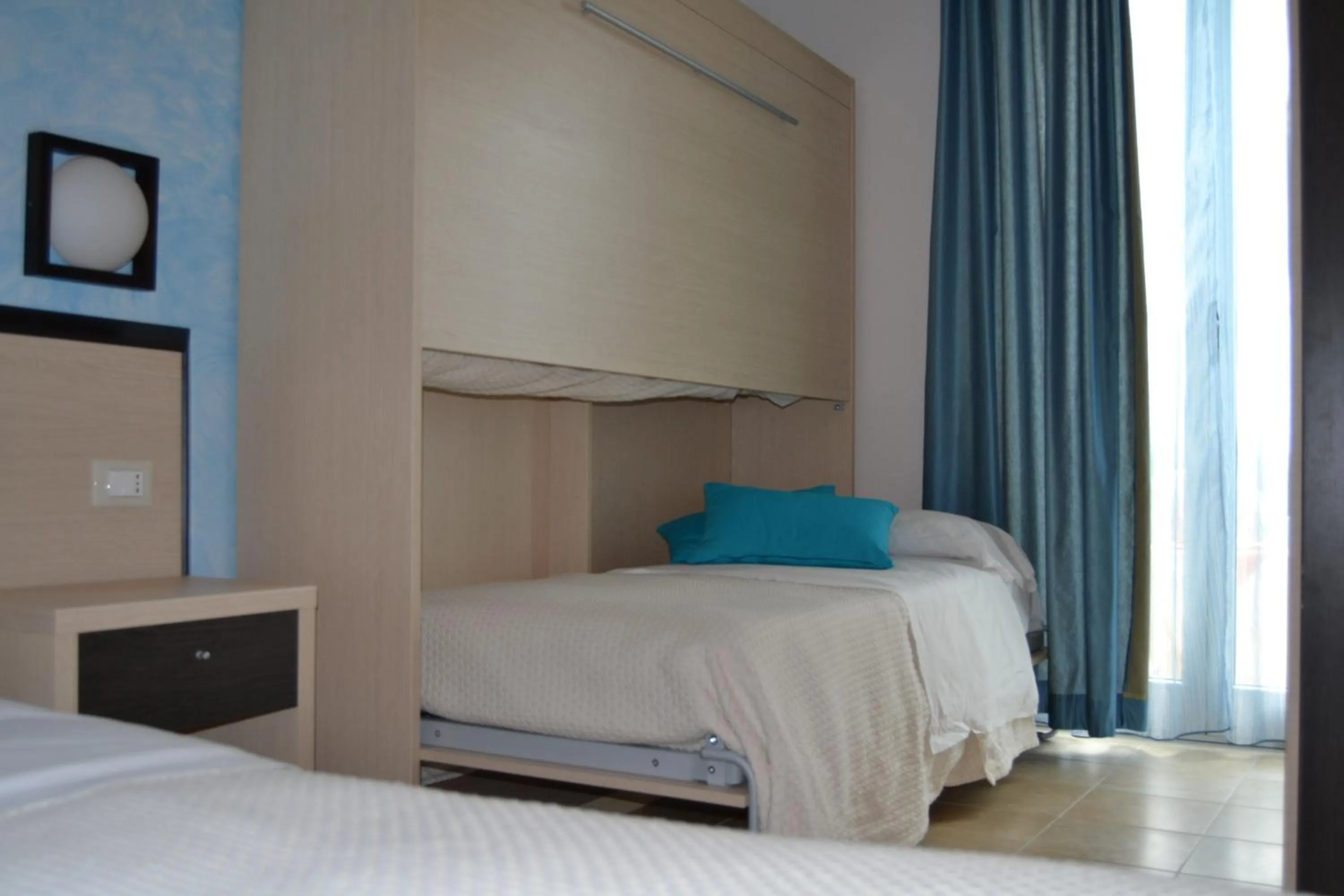 Bed in Hotel La Siesta