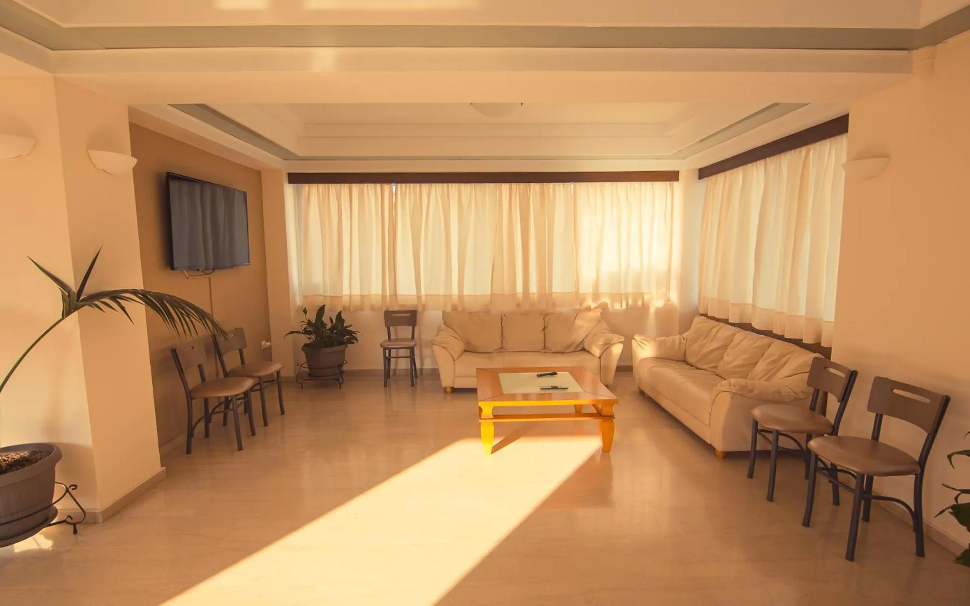 Living room in Adonis Hotel