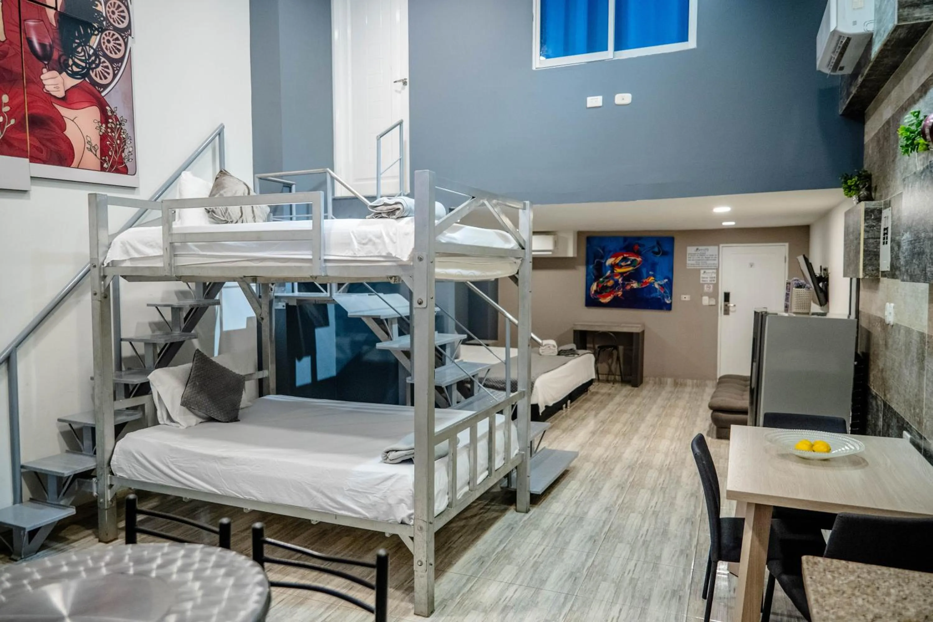 Bed in Bahia 79 Apartasuites Cerca al Centro