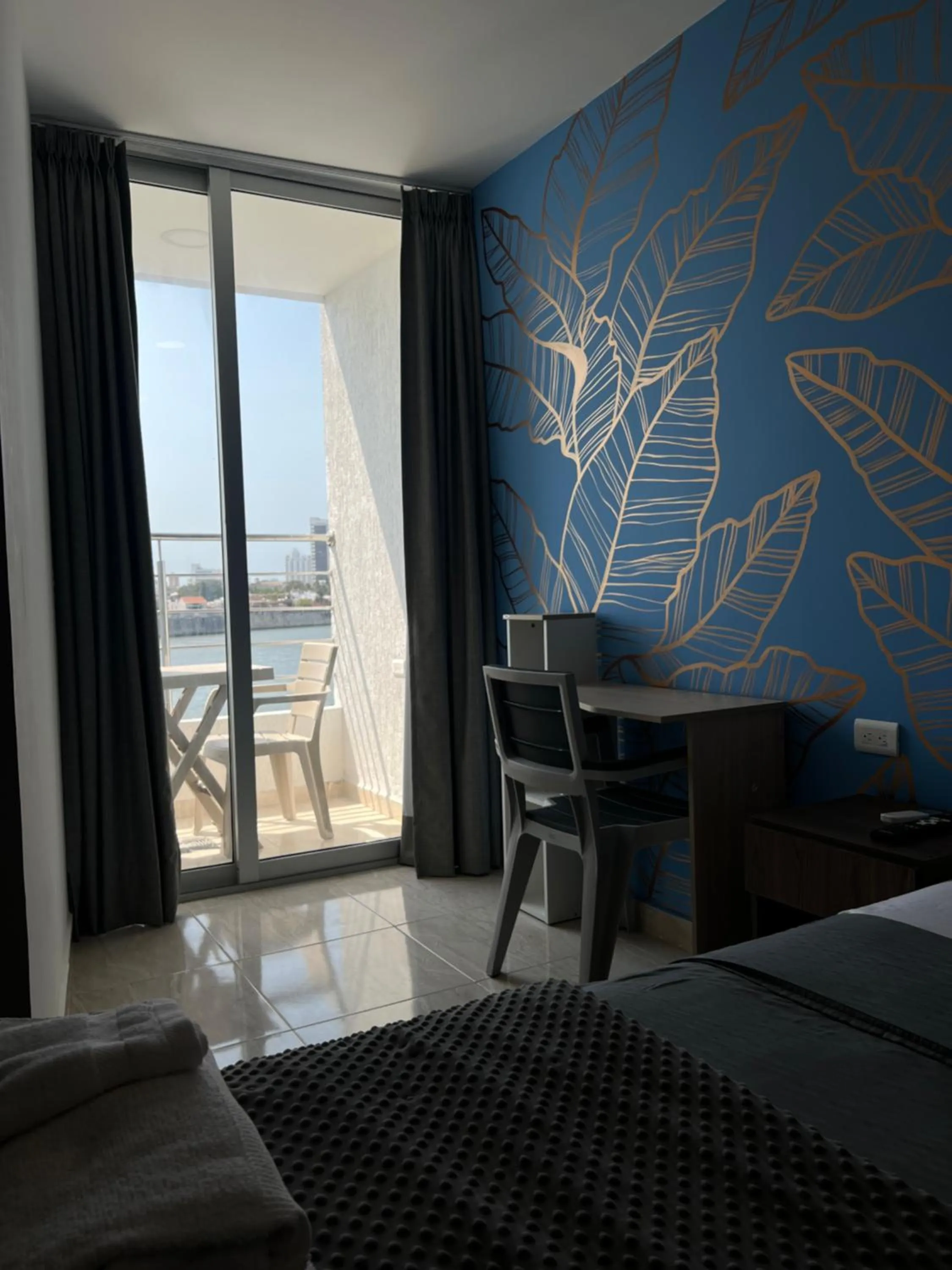 Photo of the whole room, Bed in Bahia 79 Apartasuites Cerca al Centro