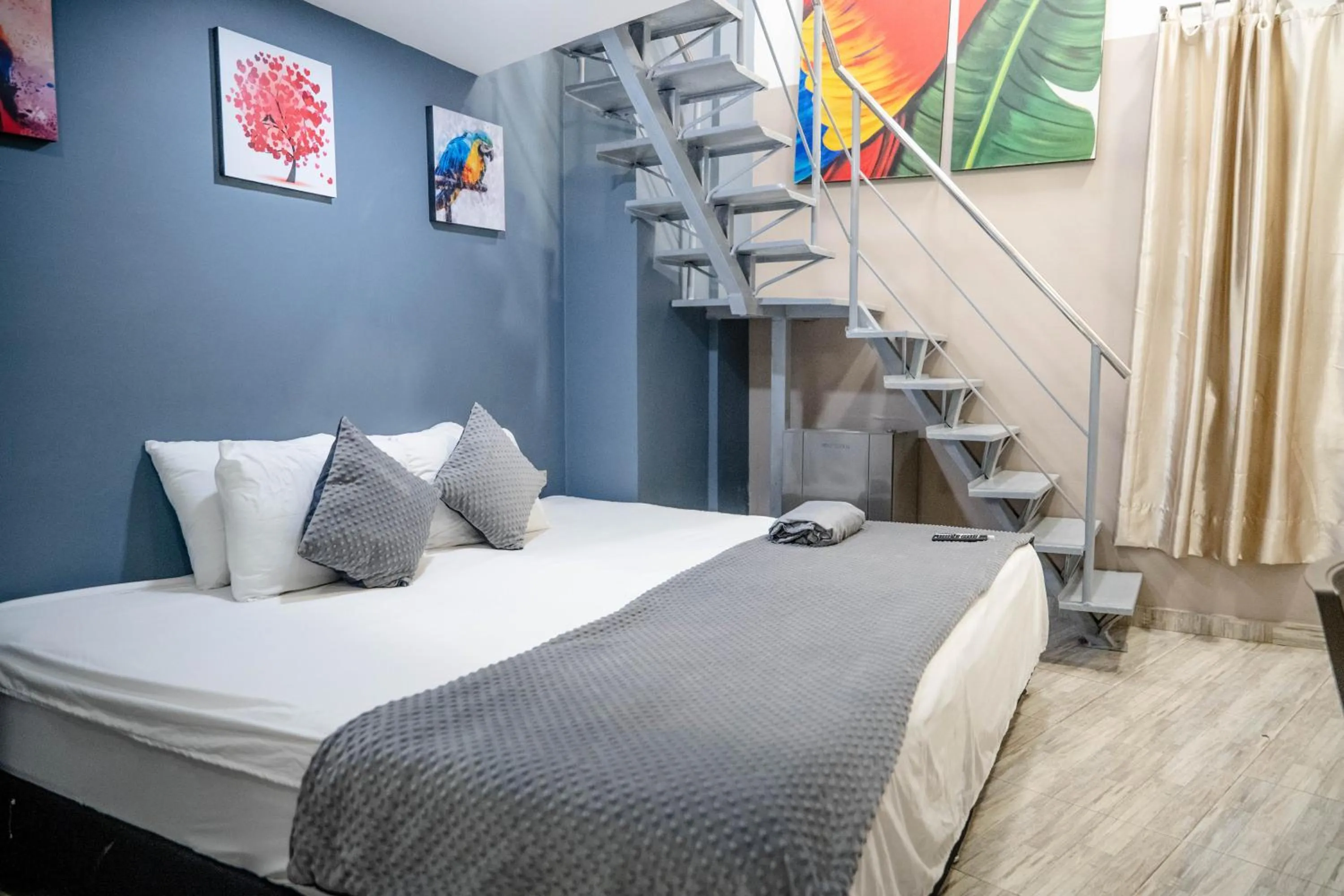 Bed in Bahia 79 Apartasuites Cerca al Centro