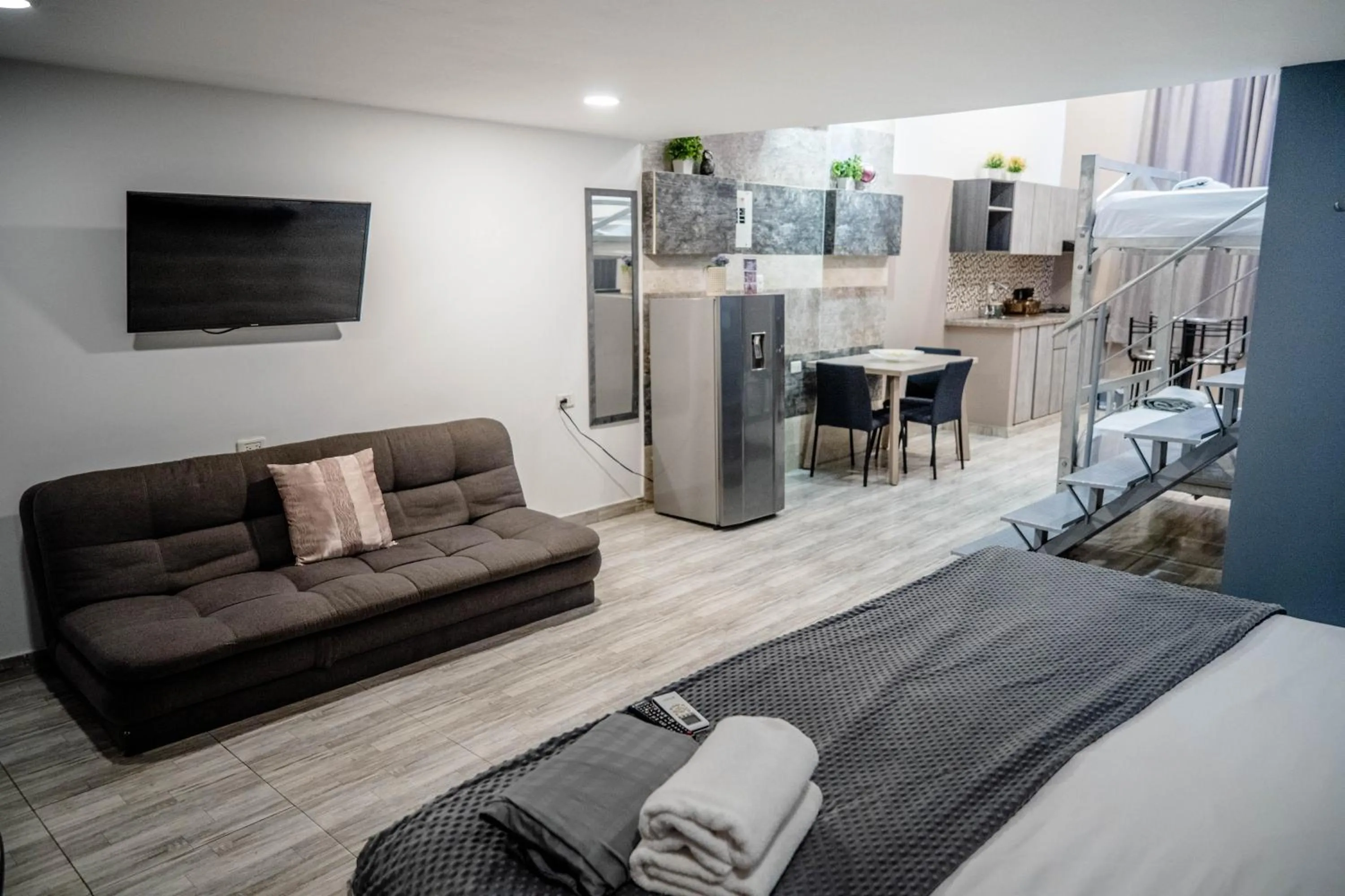 Bed in Bahia 79 Apartasuites Cerca al Centro