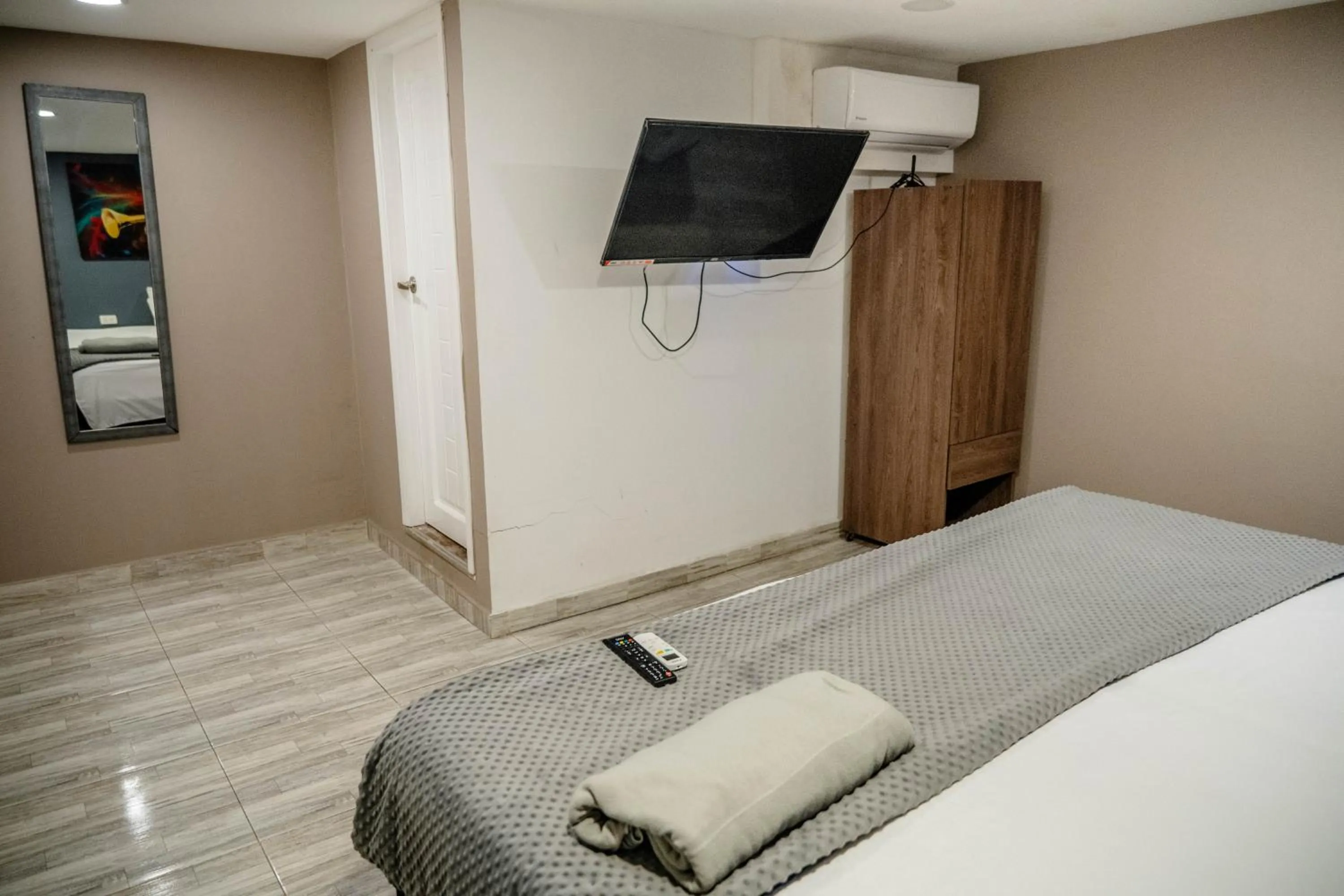 Bed in Bahia 79 Apartasuites Cerca al Centro