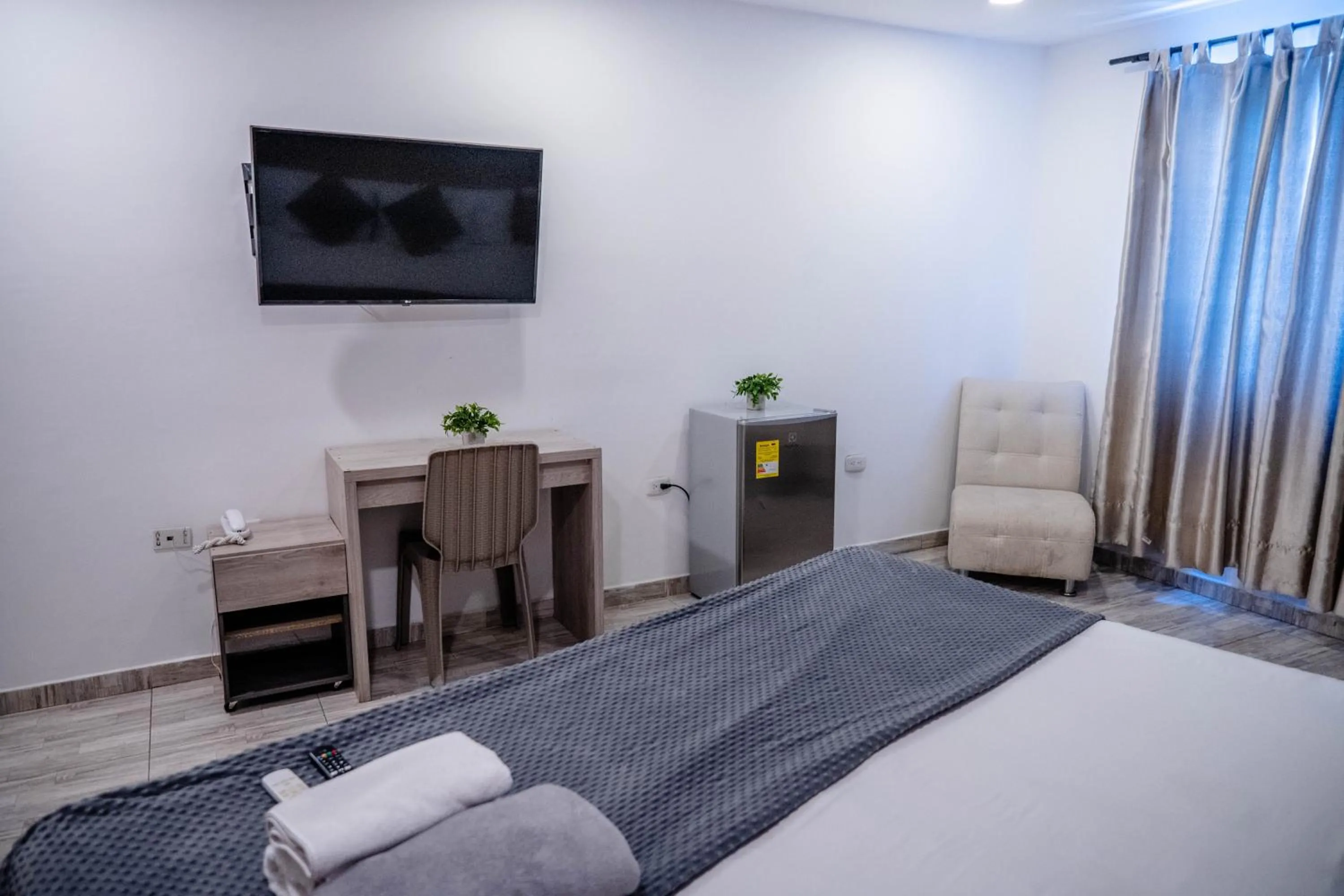 Bed in Bahia 79 Apartasuites Cerca al Centro