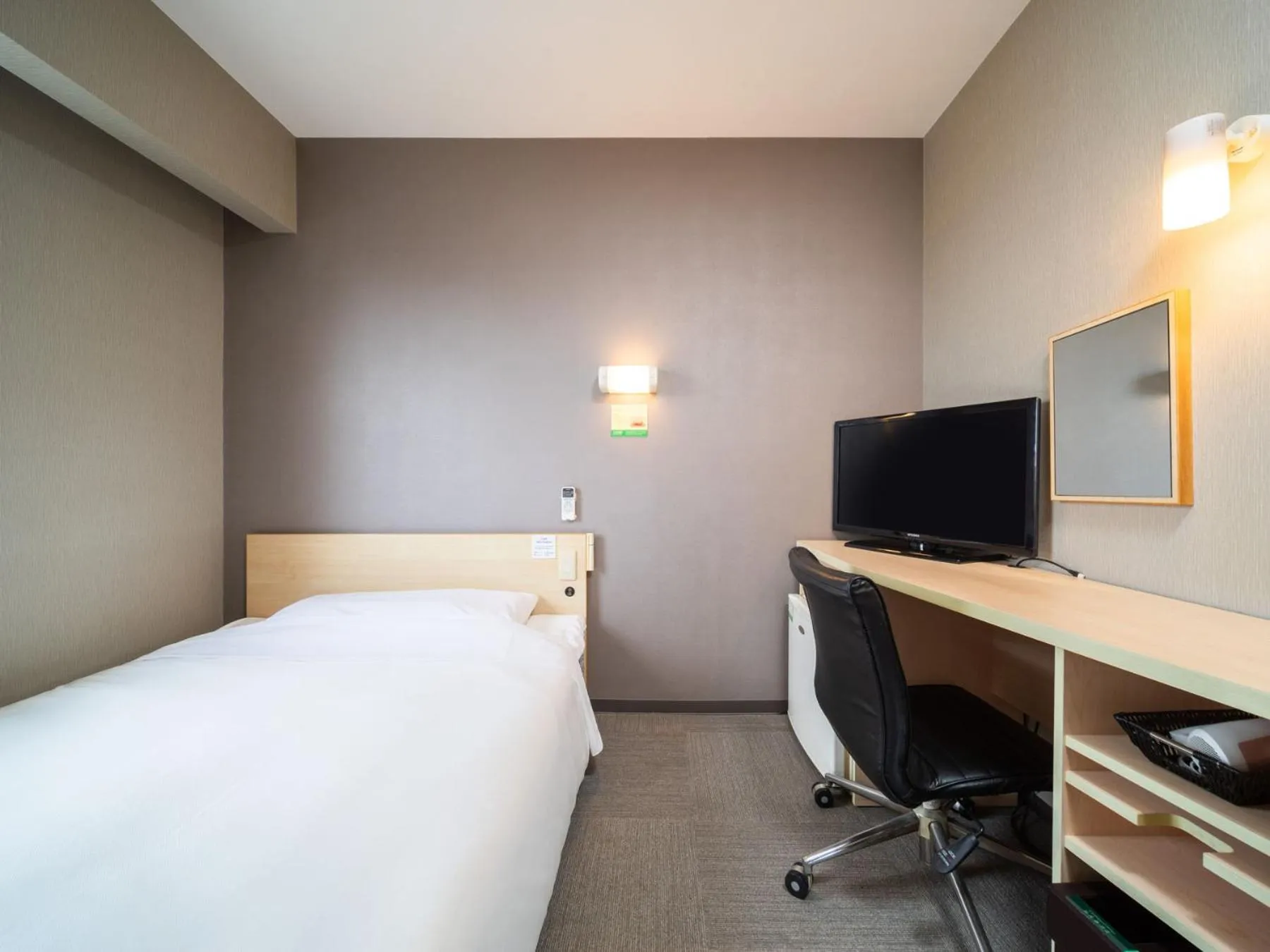 Bed in Super Hotel Fuji Inter