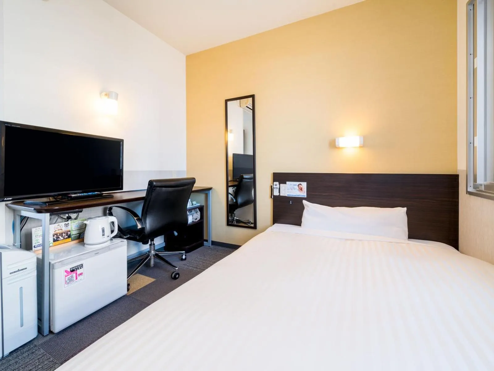 Bed in Super Hotel Fuji Inter