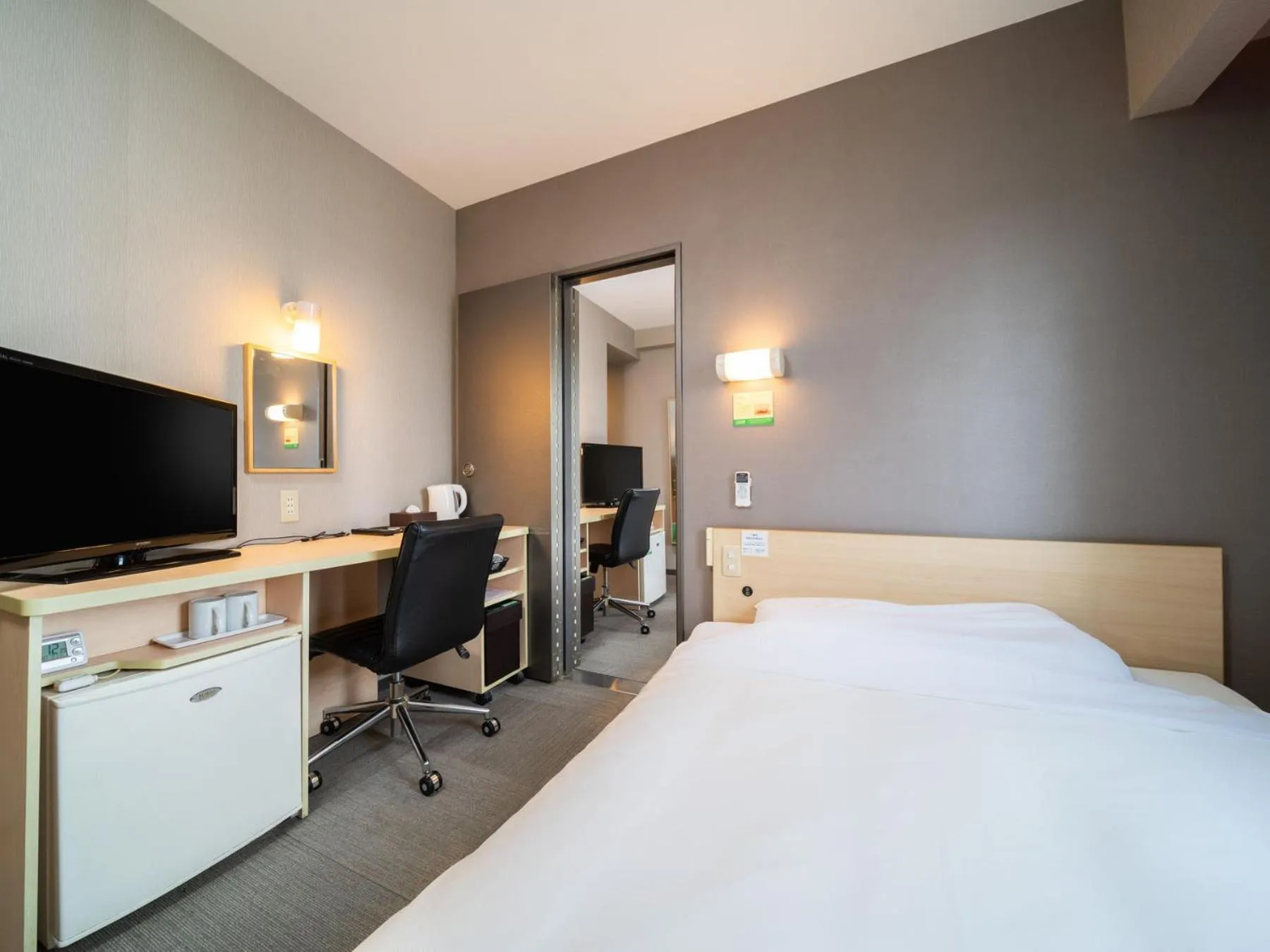 Bed in Super Hotel Fuji Inter