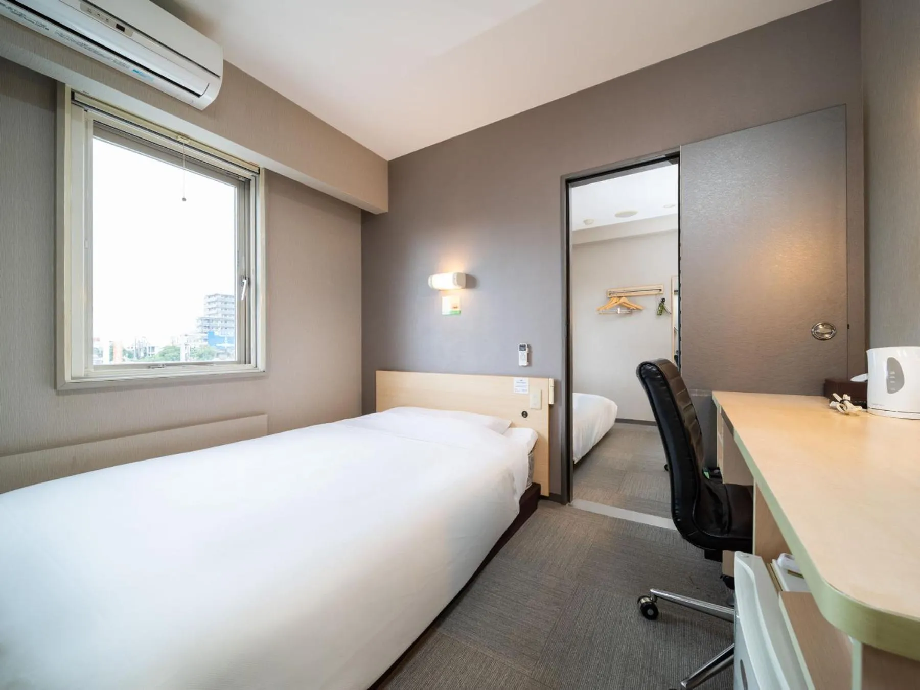 Bed in Super Hotel Fuji Inter