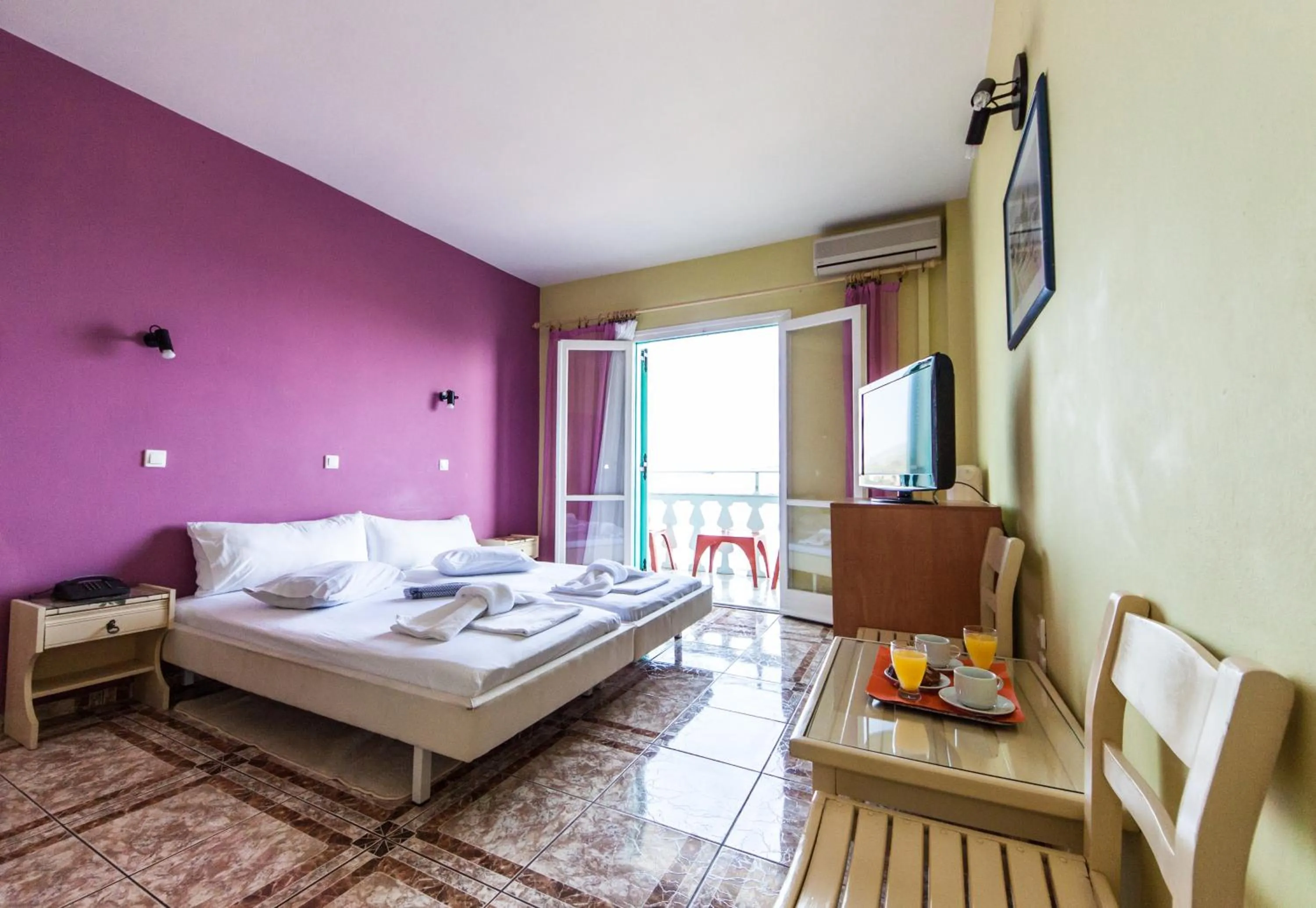 Bed in Kokkari Beach Hotel